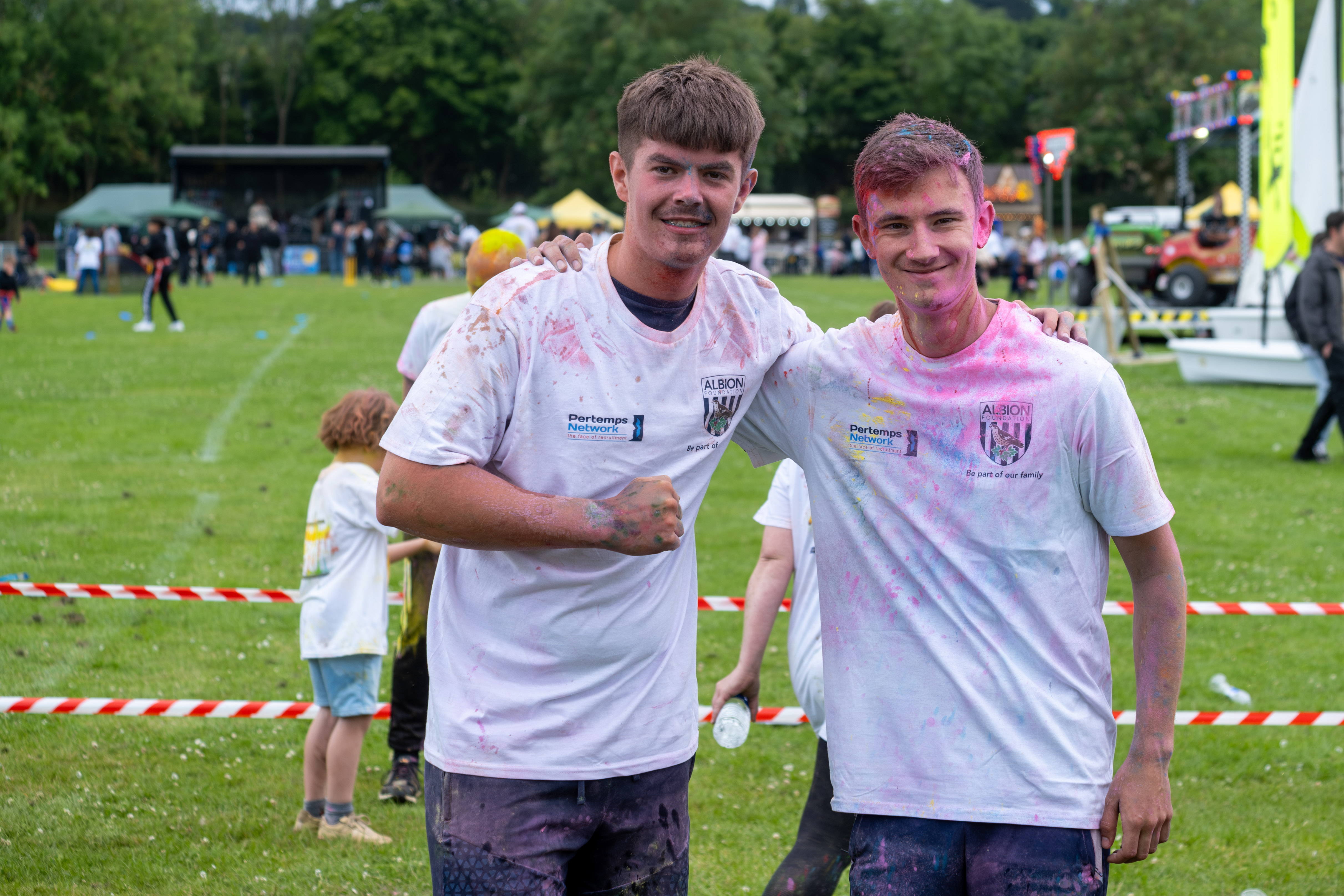 Foundation staff, one giving a thumbs up, after completing the run.