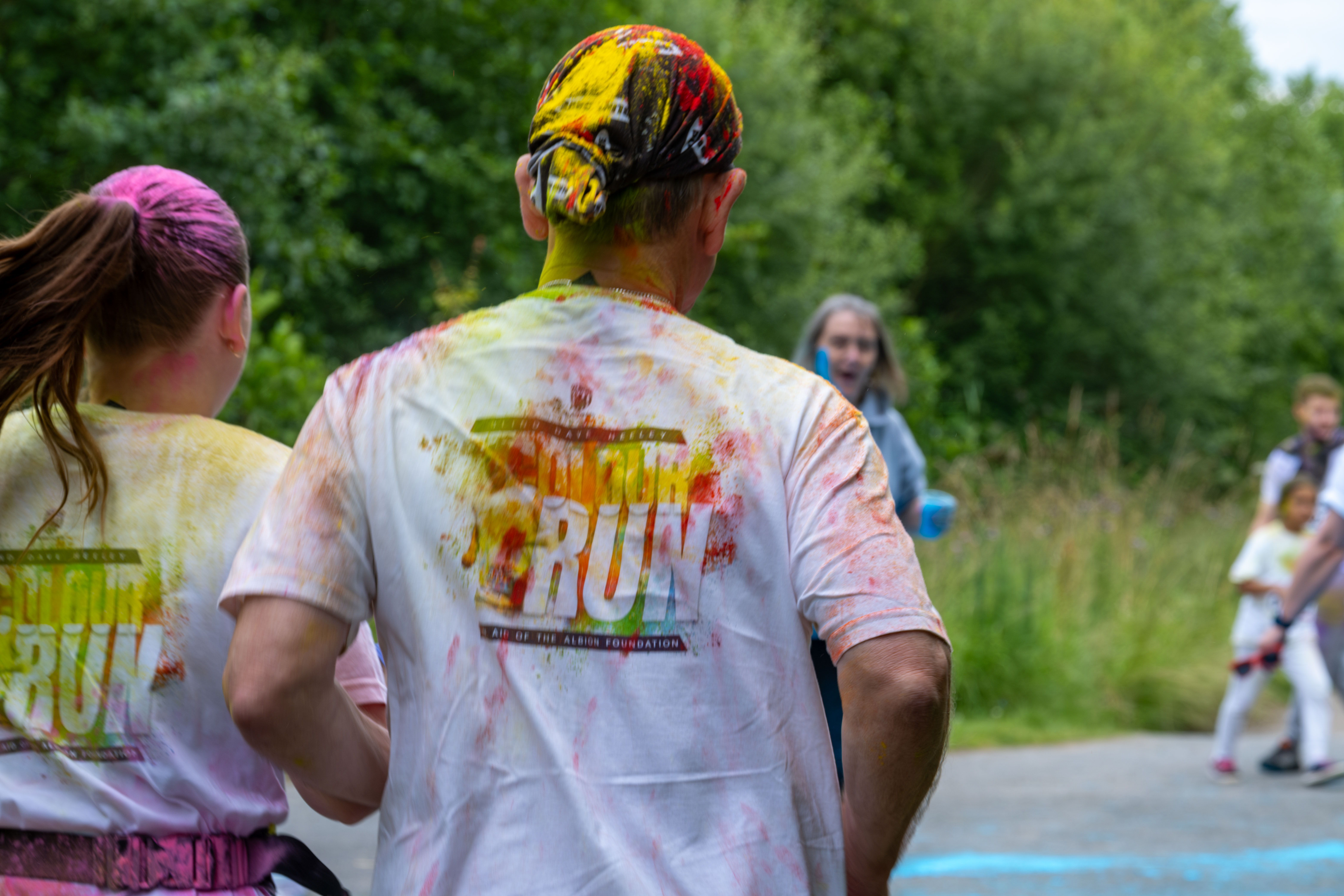 Back of runners, Dannie Heeley, and Blind Dave Heeley, heading towards a colour station.