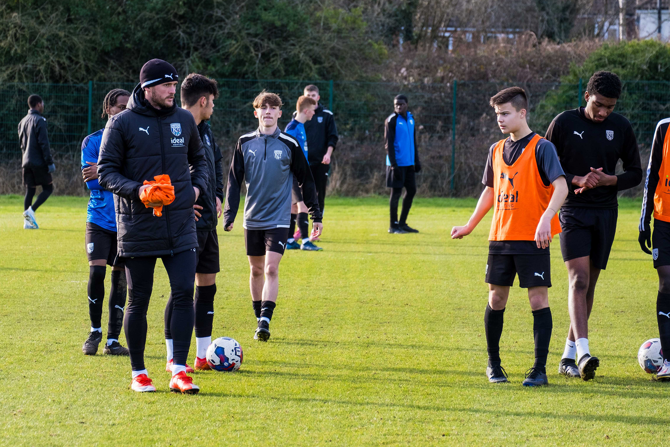 Reece at Post-16 training, six teammates setting up for the next drill led by John Swift.