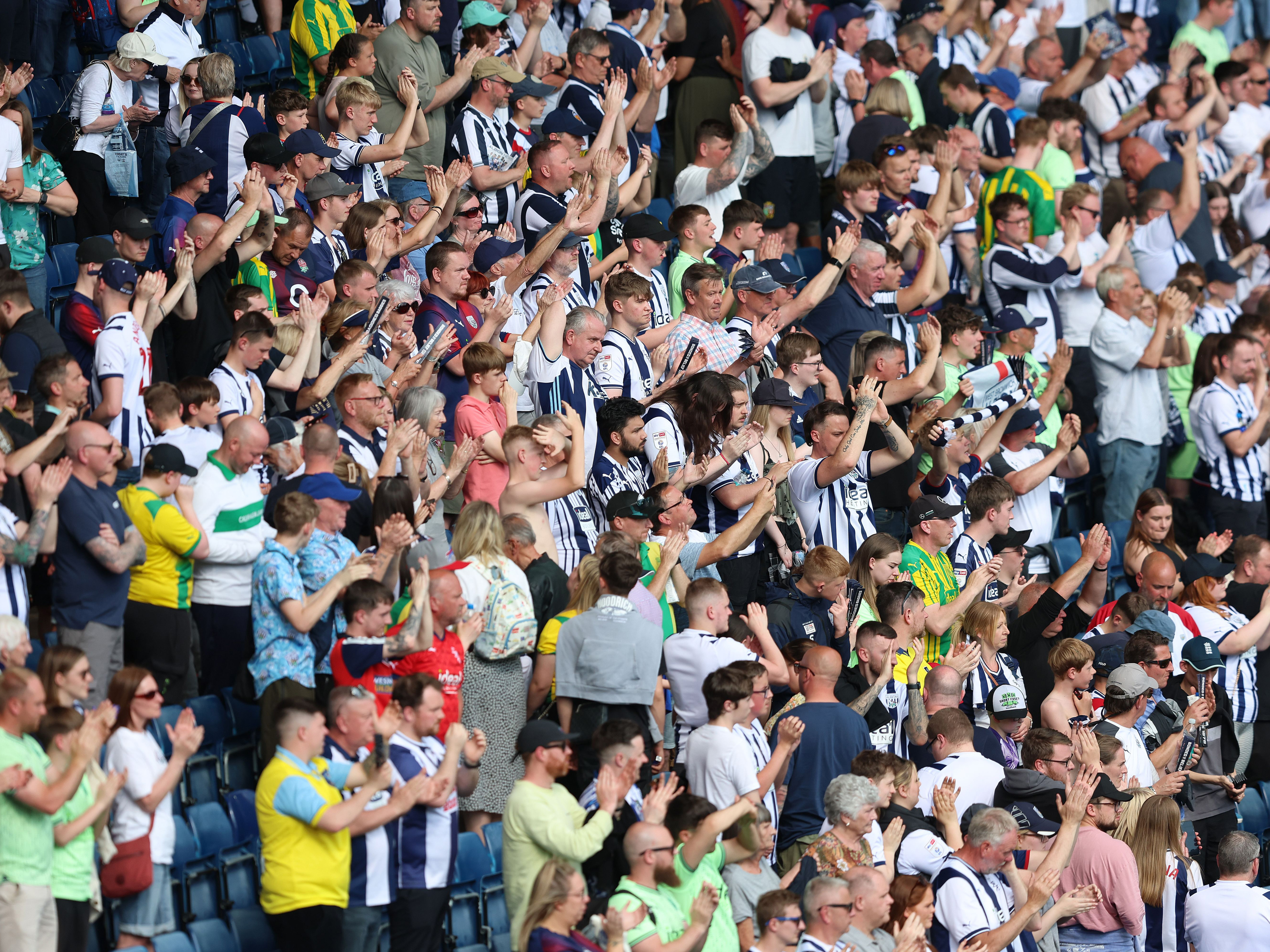 Albion fans applaud their team at The Hawthorns