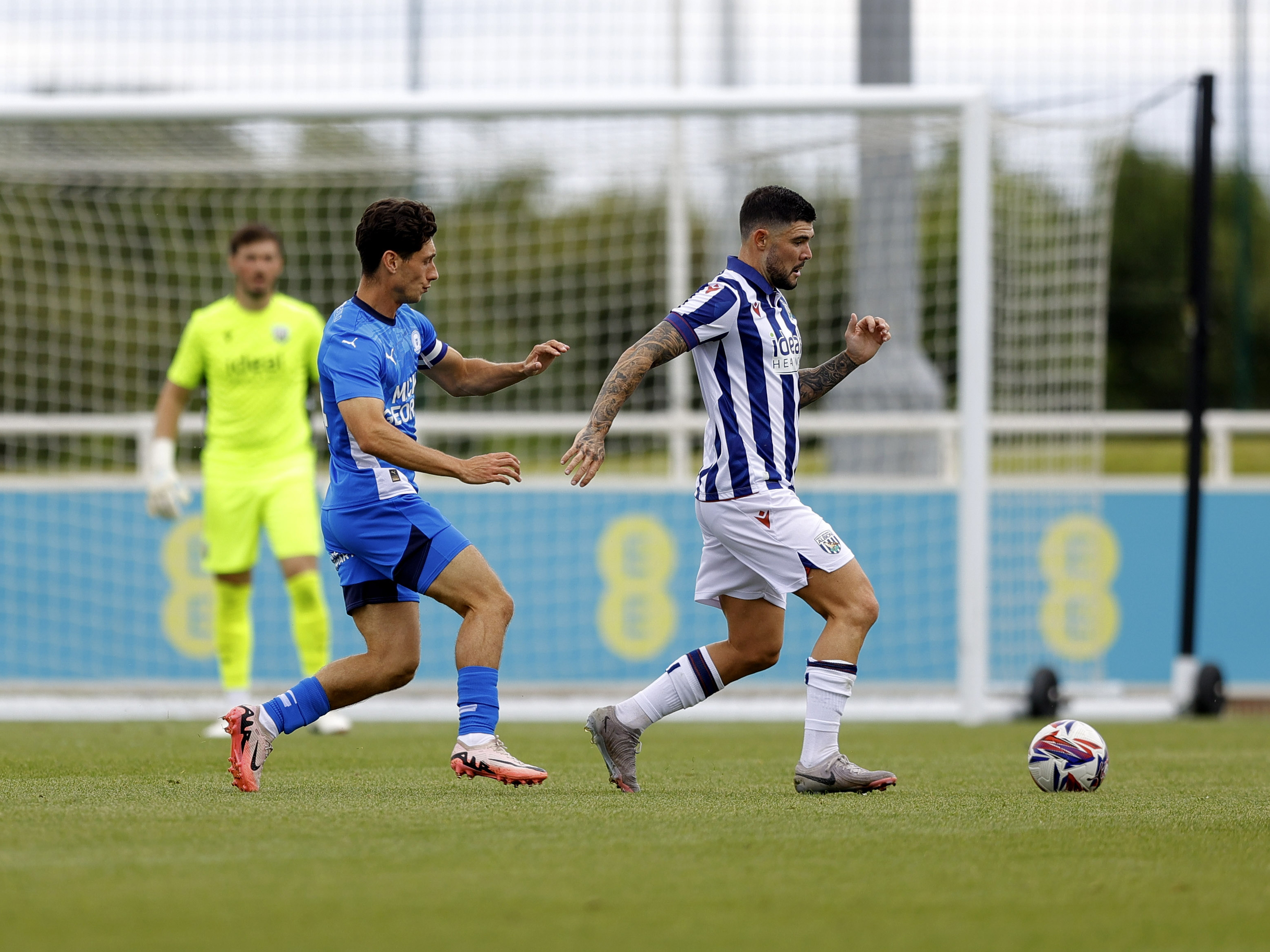 An image of Alex Mowatt on the ball during Albion's friendly against Peterborough