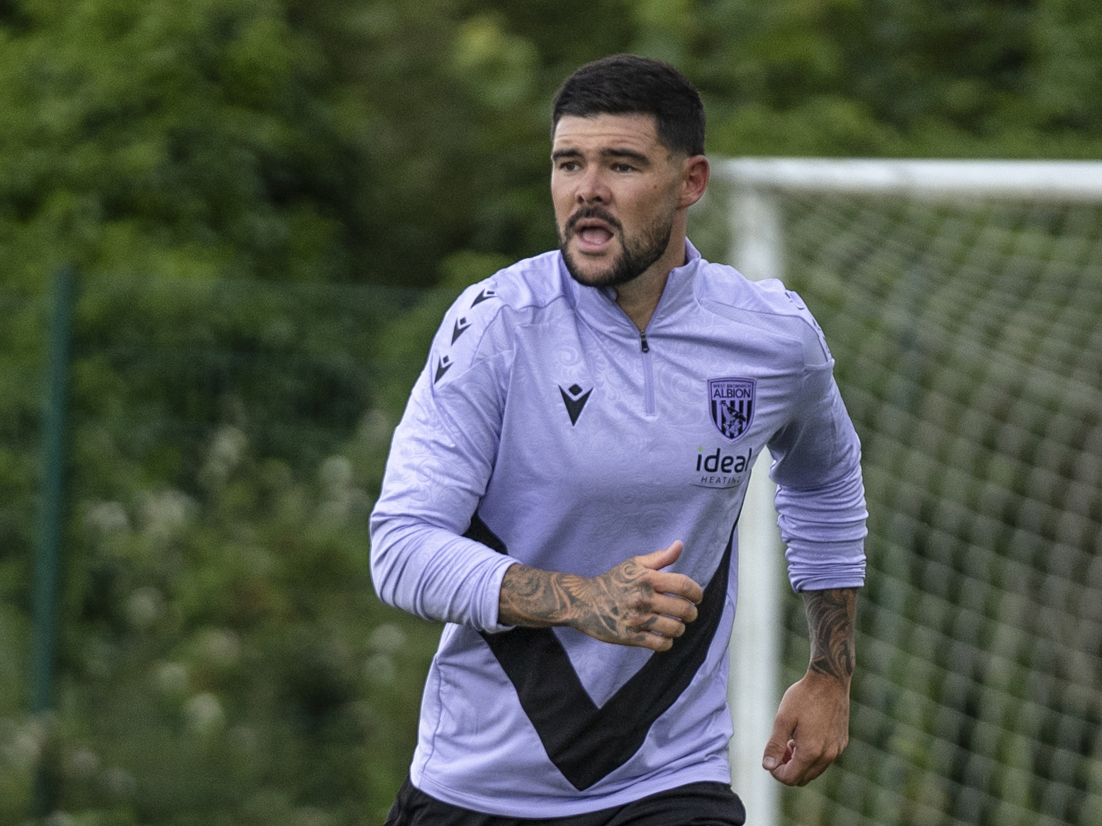 Alex Mowatt looking for the ball during a training session 