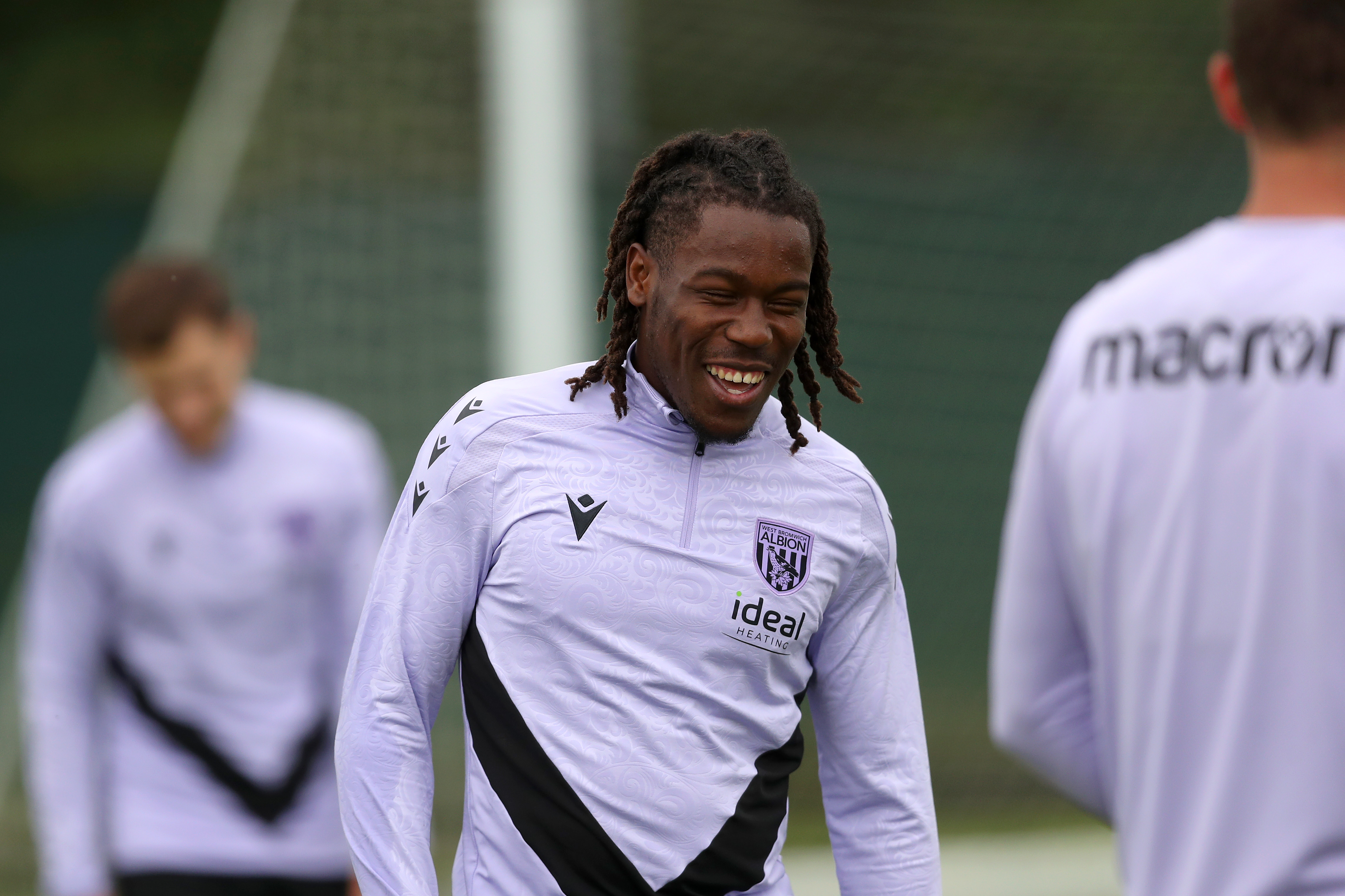 Brandon Thomas-Asante smiling during a training session