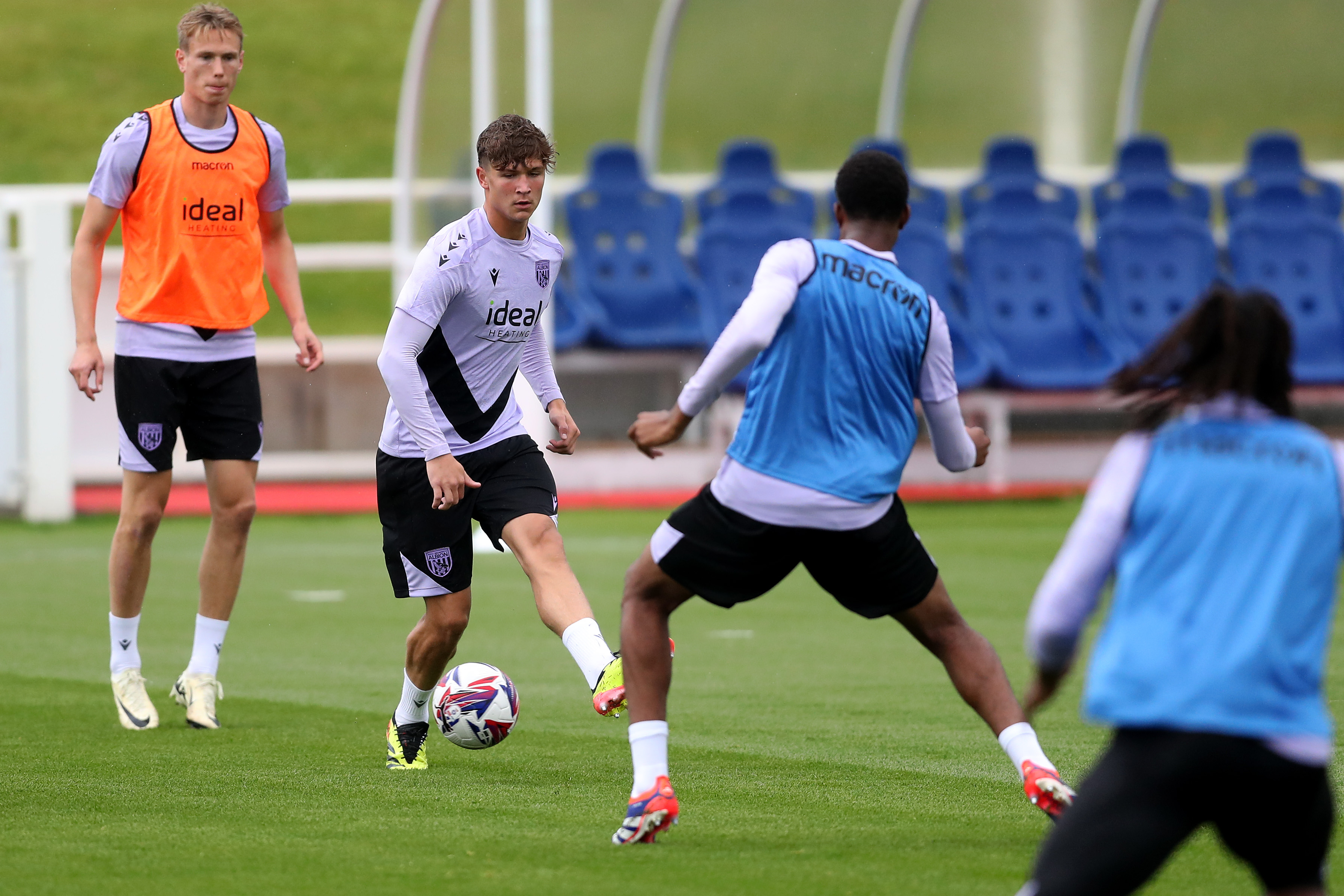 Cole Deeming on the ball during a training session at St. George's Park