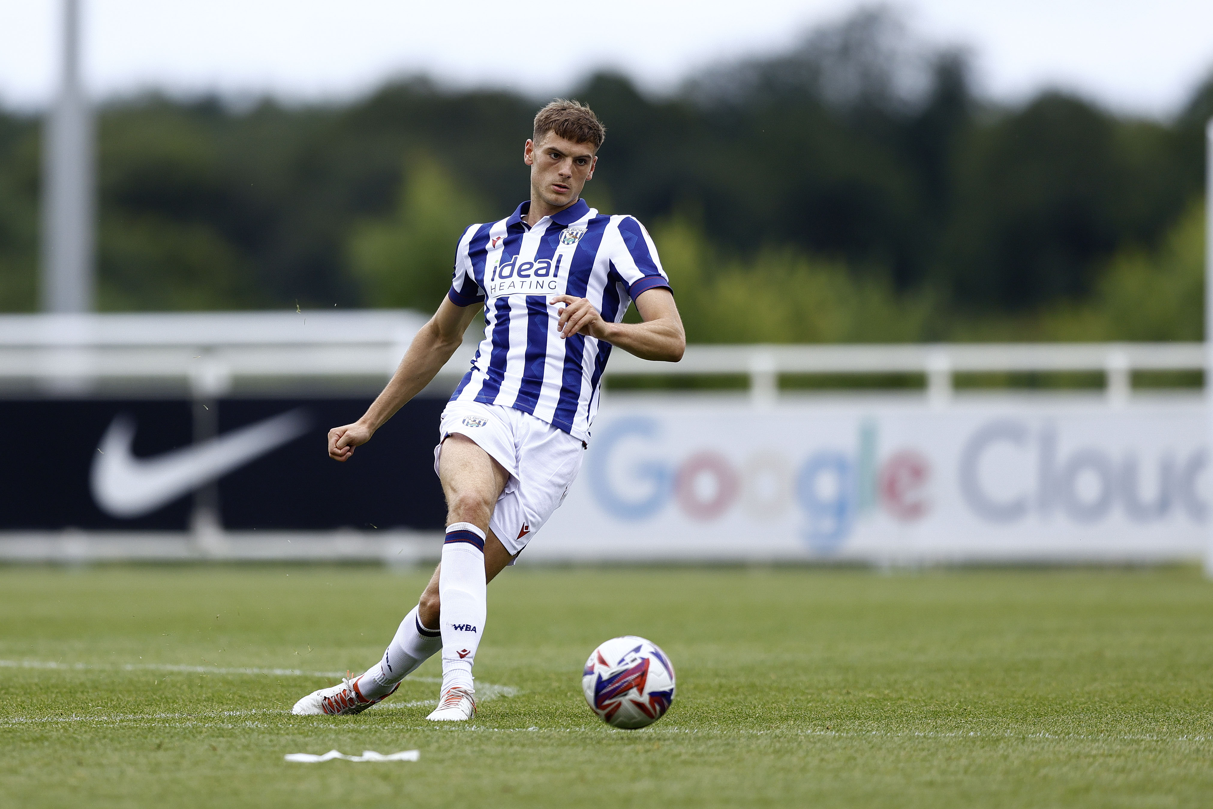 Caleb Taylor in action for Albion in the home shirt in a pre-season friendly 