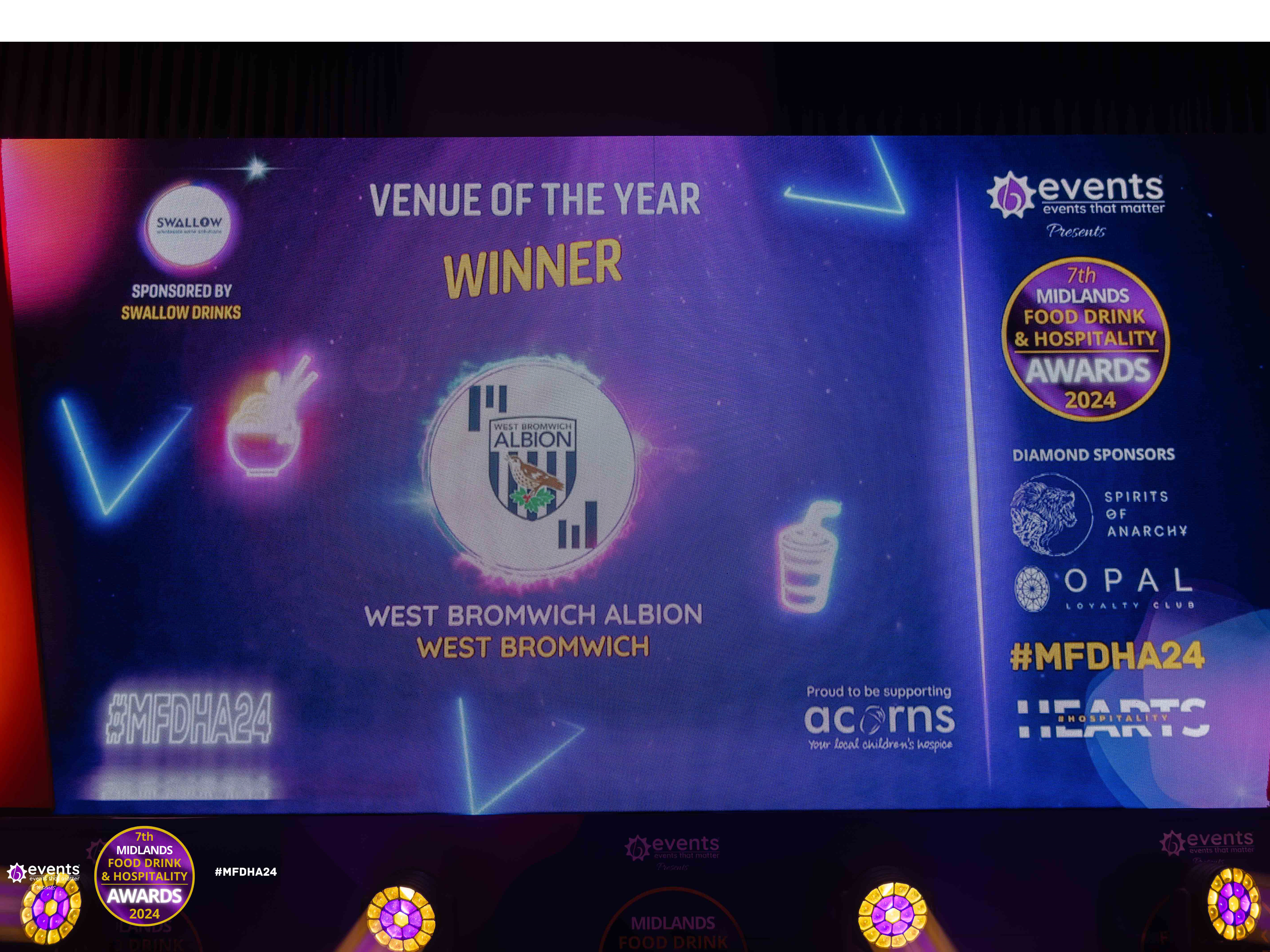 The Hawthorns Venue of the Year image up on stage at the awards