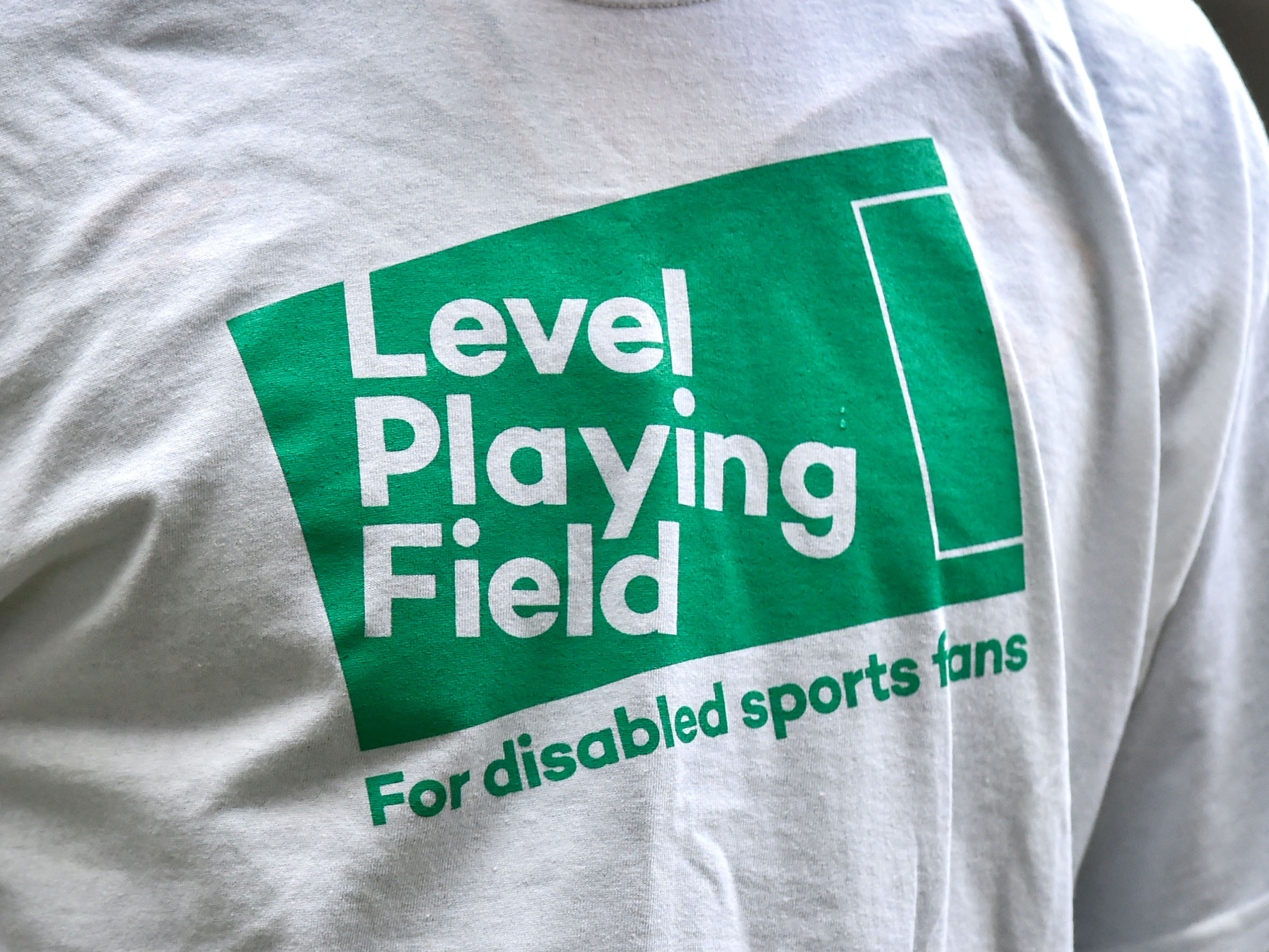 A Level Playing Field logo printed on to a white t-shirt 