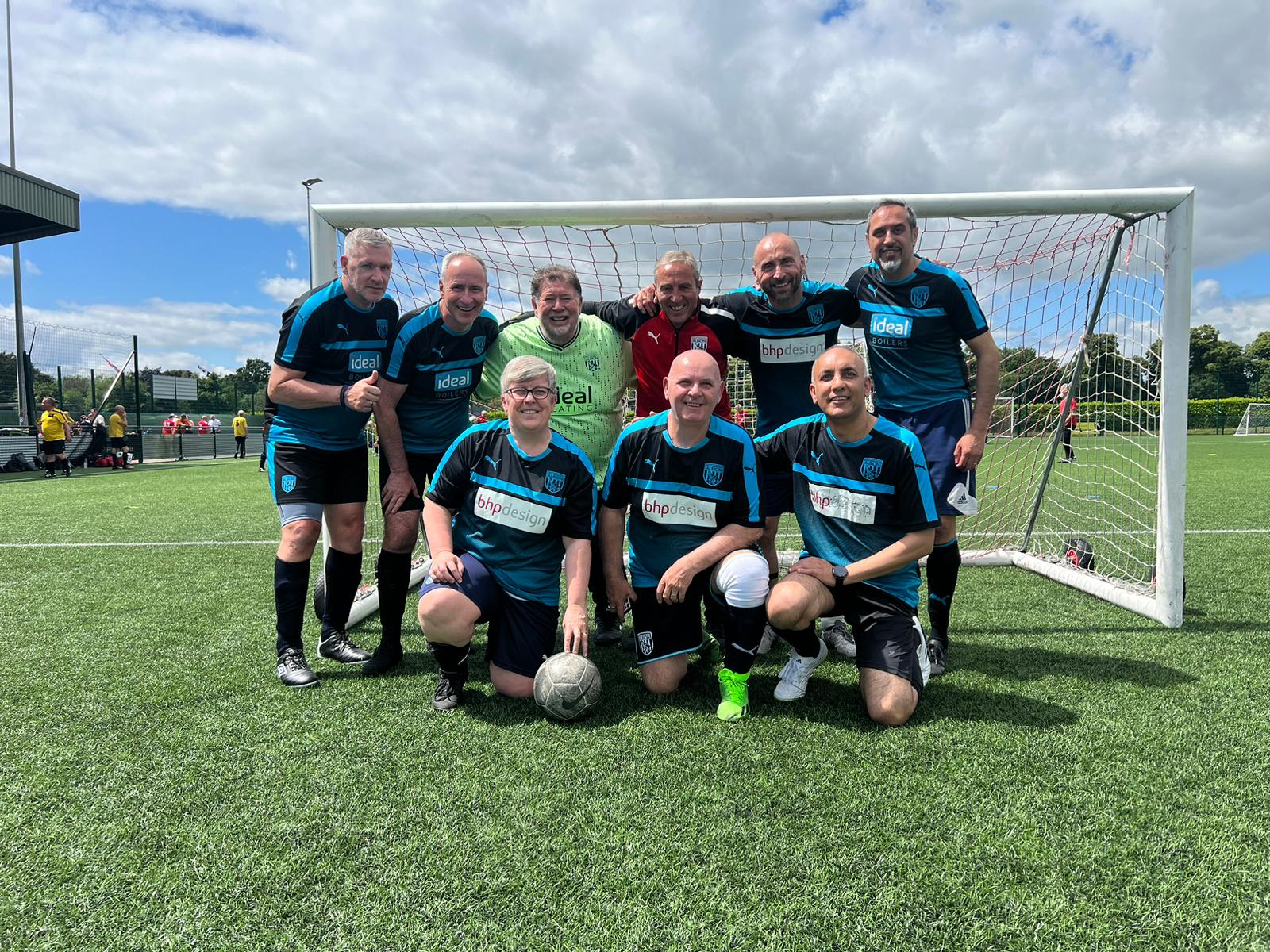 WBA Strollers posing at their first-ever walking football tournament wearing the 2018/19 away shirt.