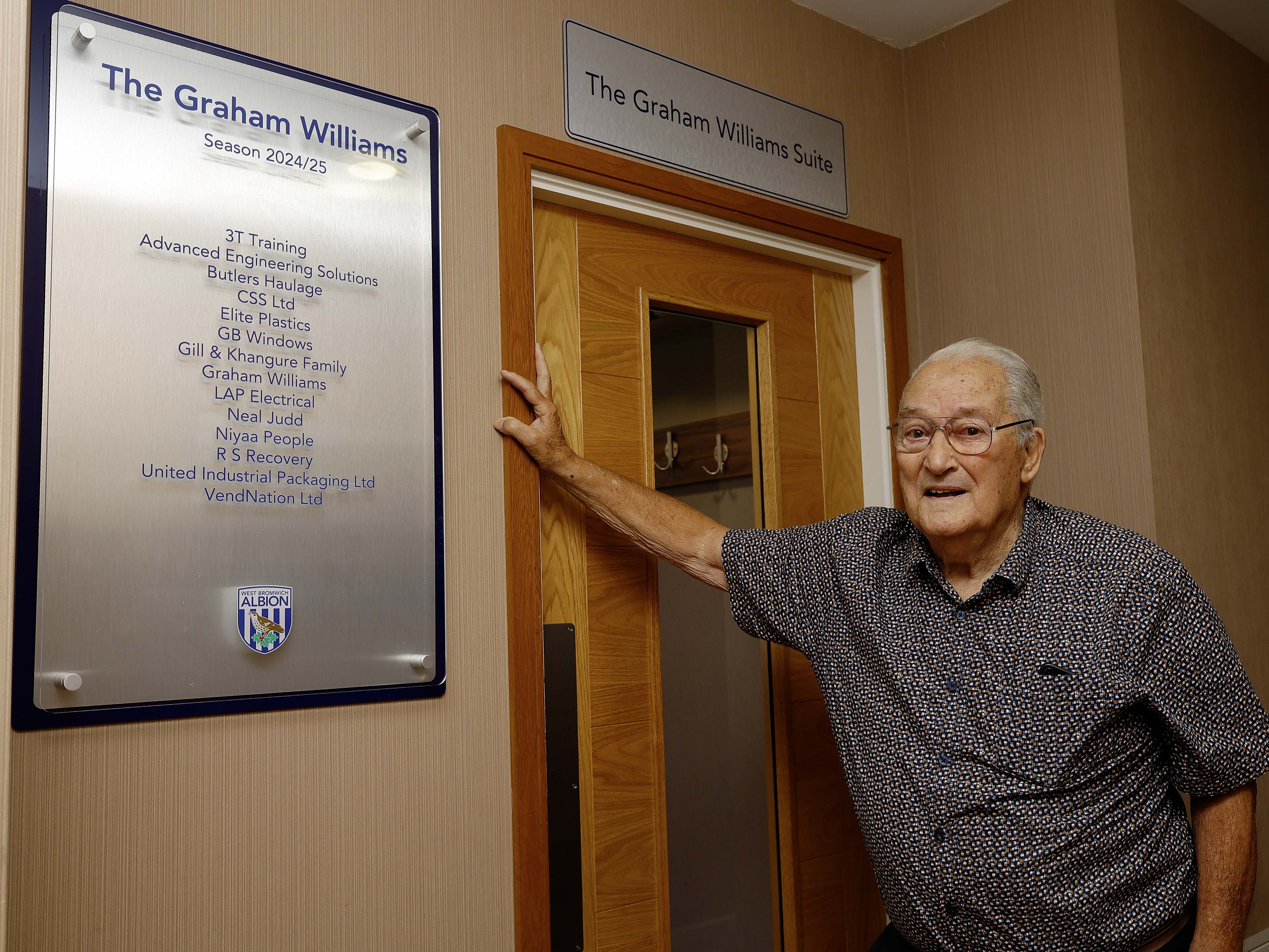 Graham Williams stood outside the Graham Williams Suite at The Hawthorns