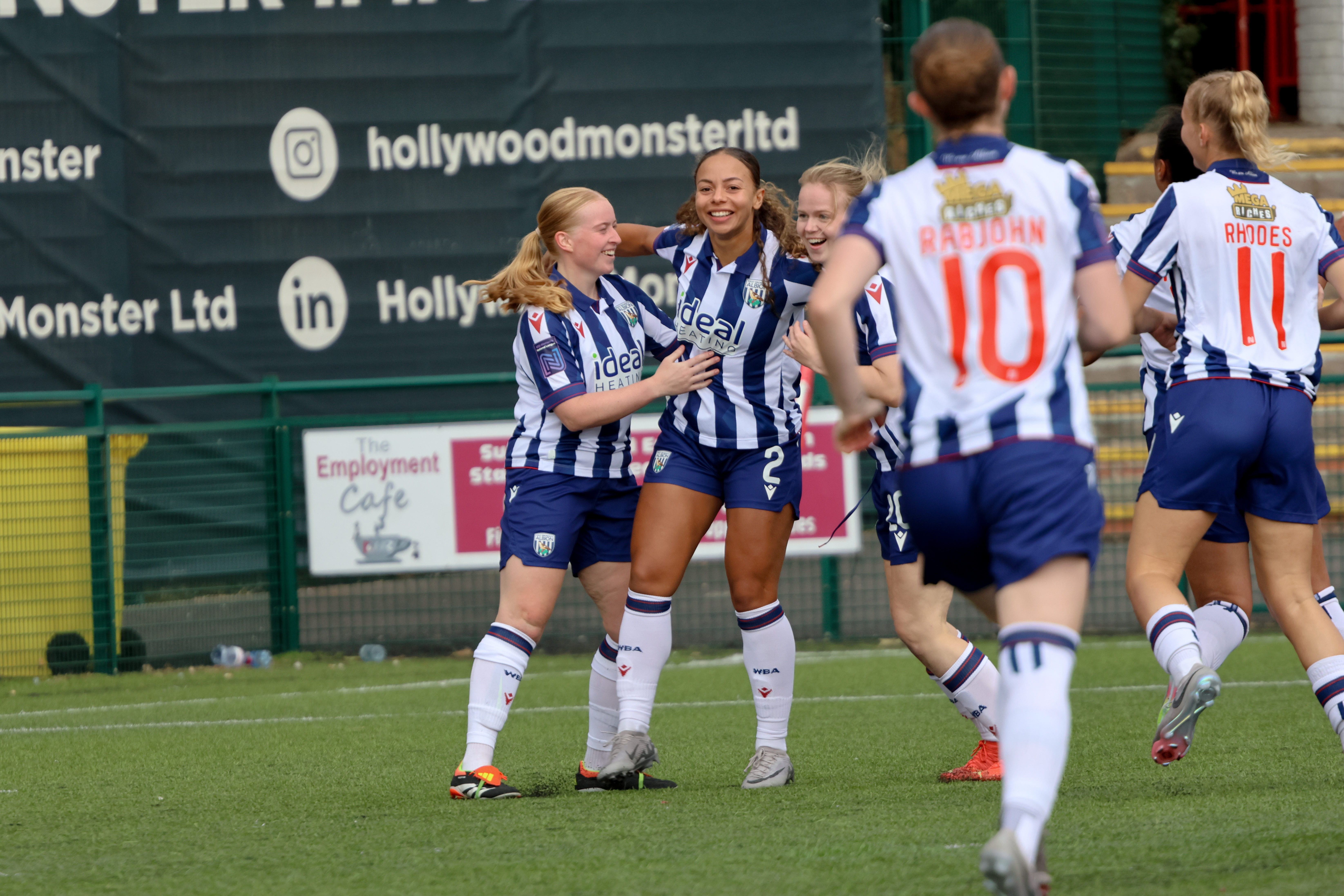 Albion Women celebrate their first goal against Halifax.