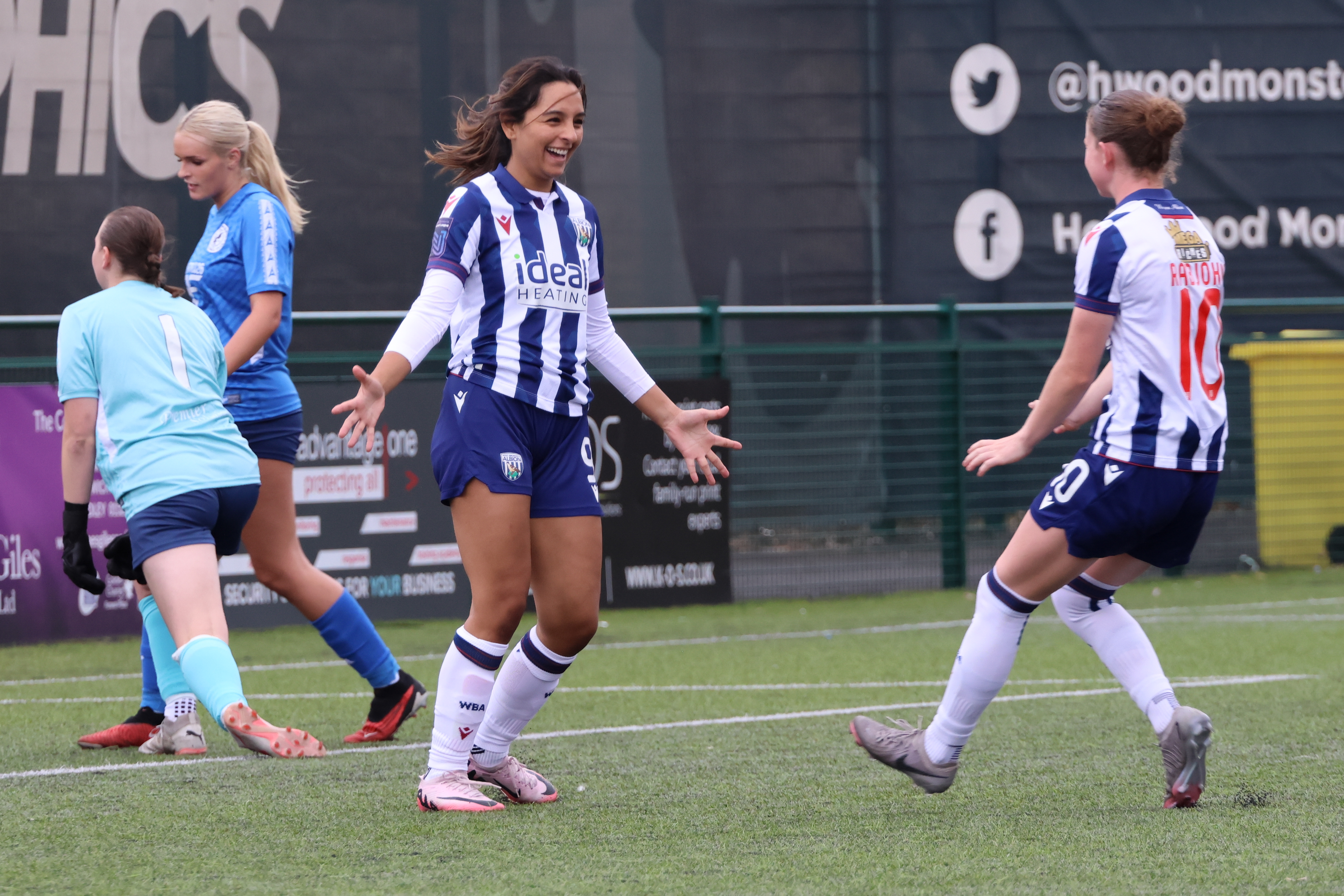 Mariam Mahmood and Olivia Rabjohn celebrate.