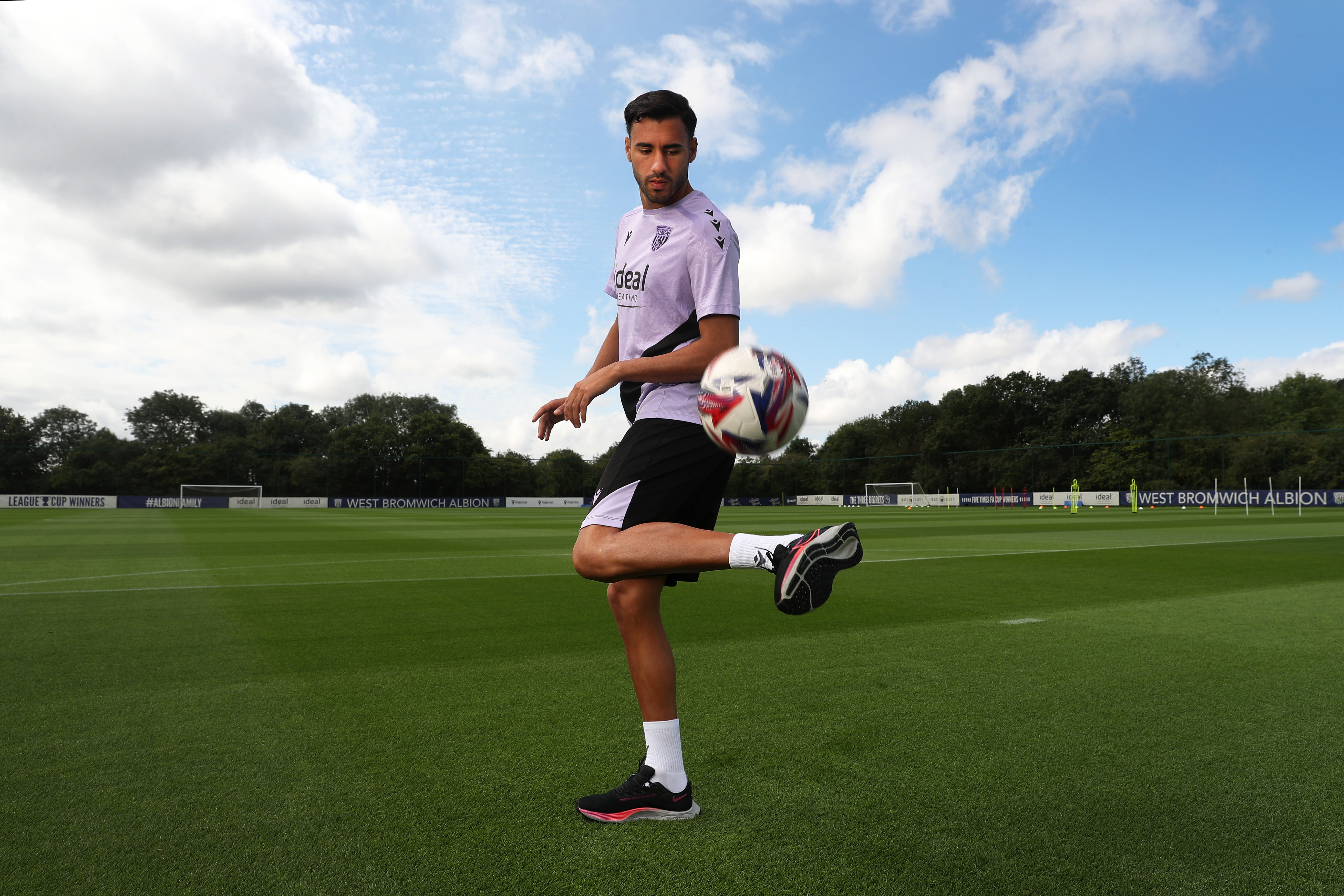 Gianluca Frabotta juggling a football on a training pitch 