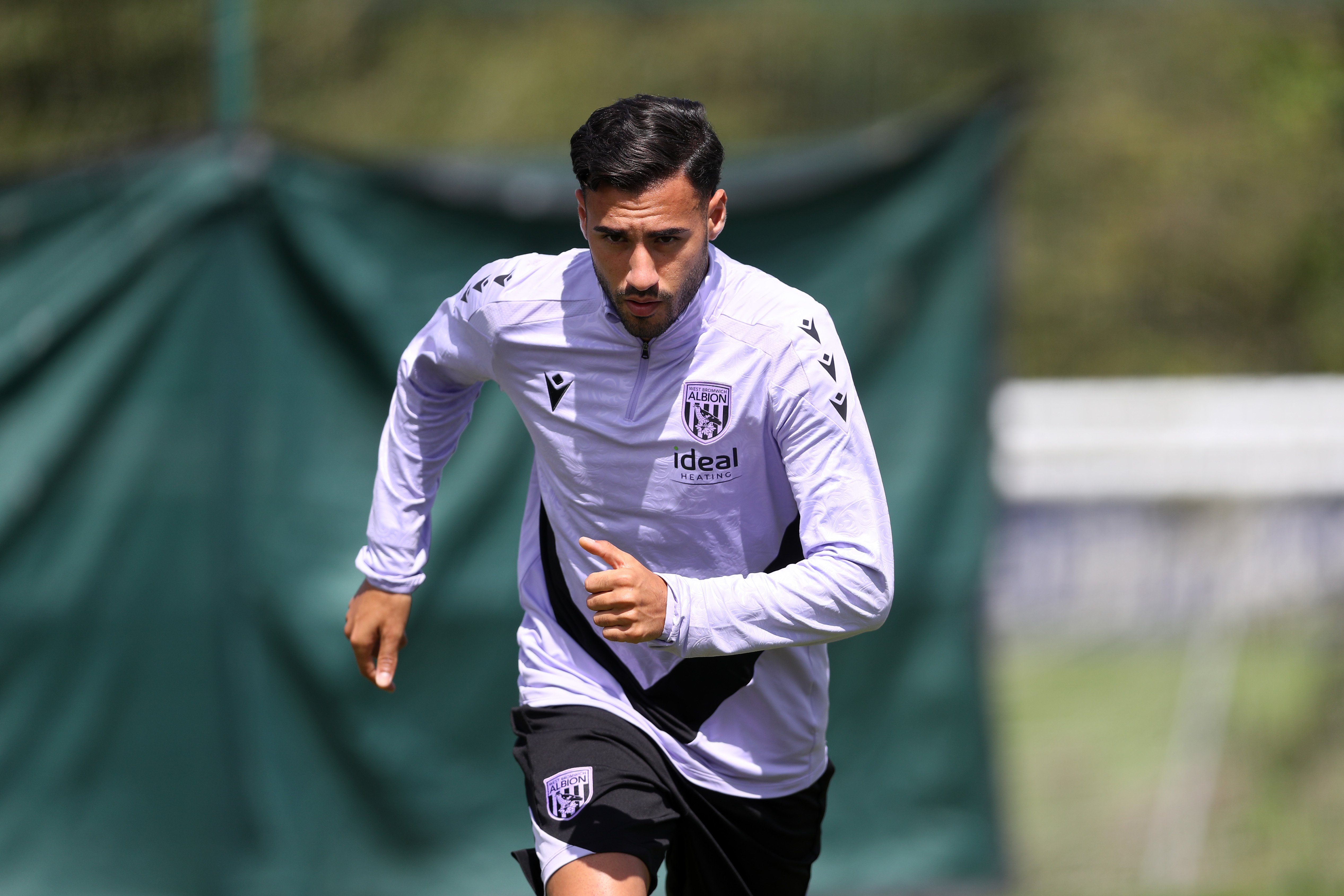 Gianluca Frabotta running in training 