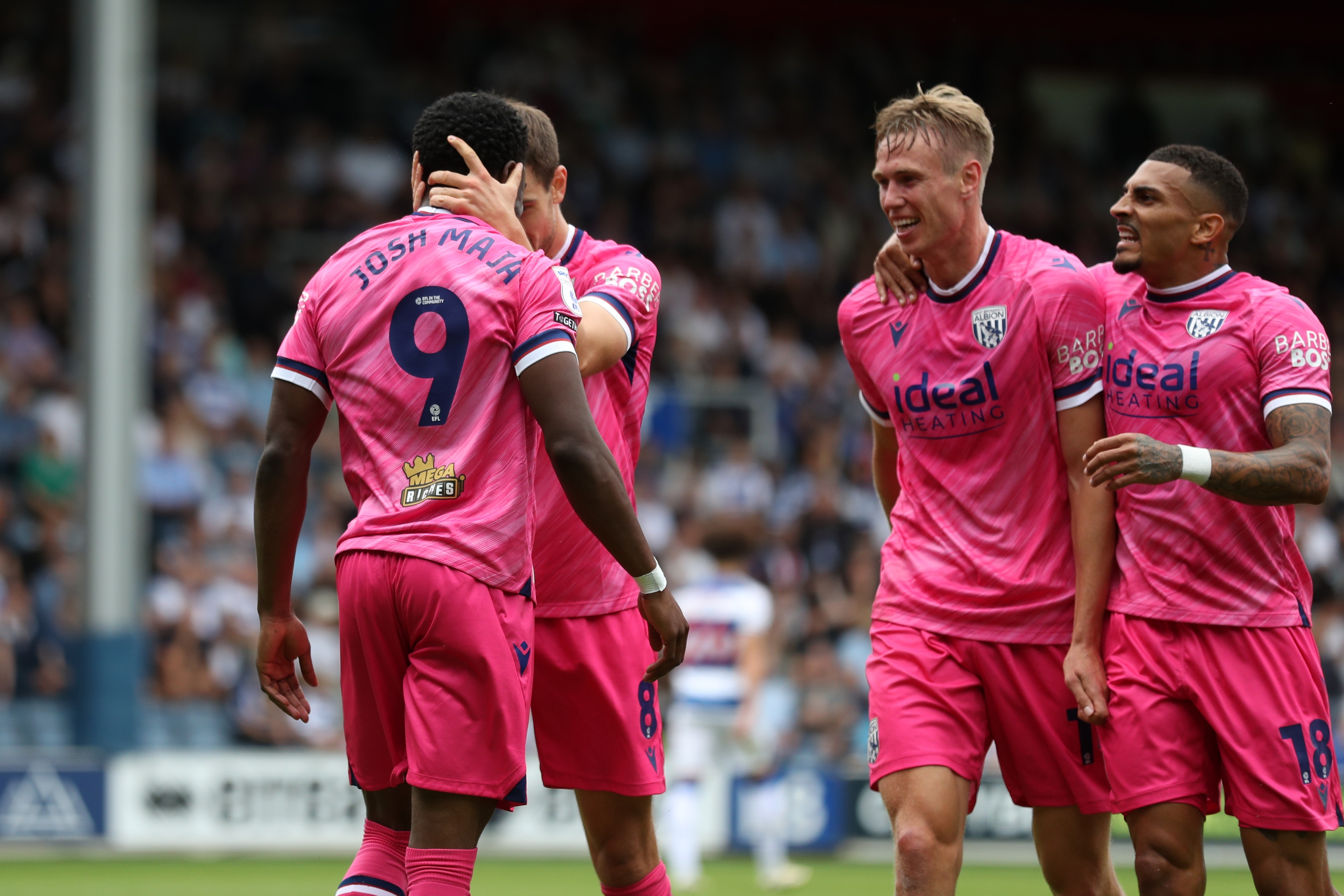 Josh Maja celebrates scoring his first goal at QPR with team-mates 