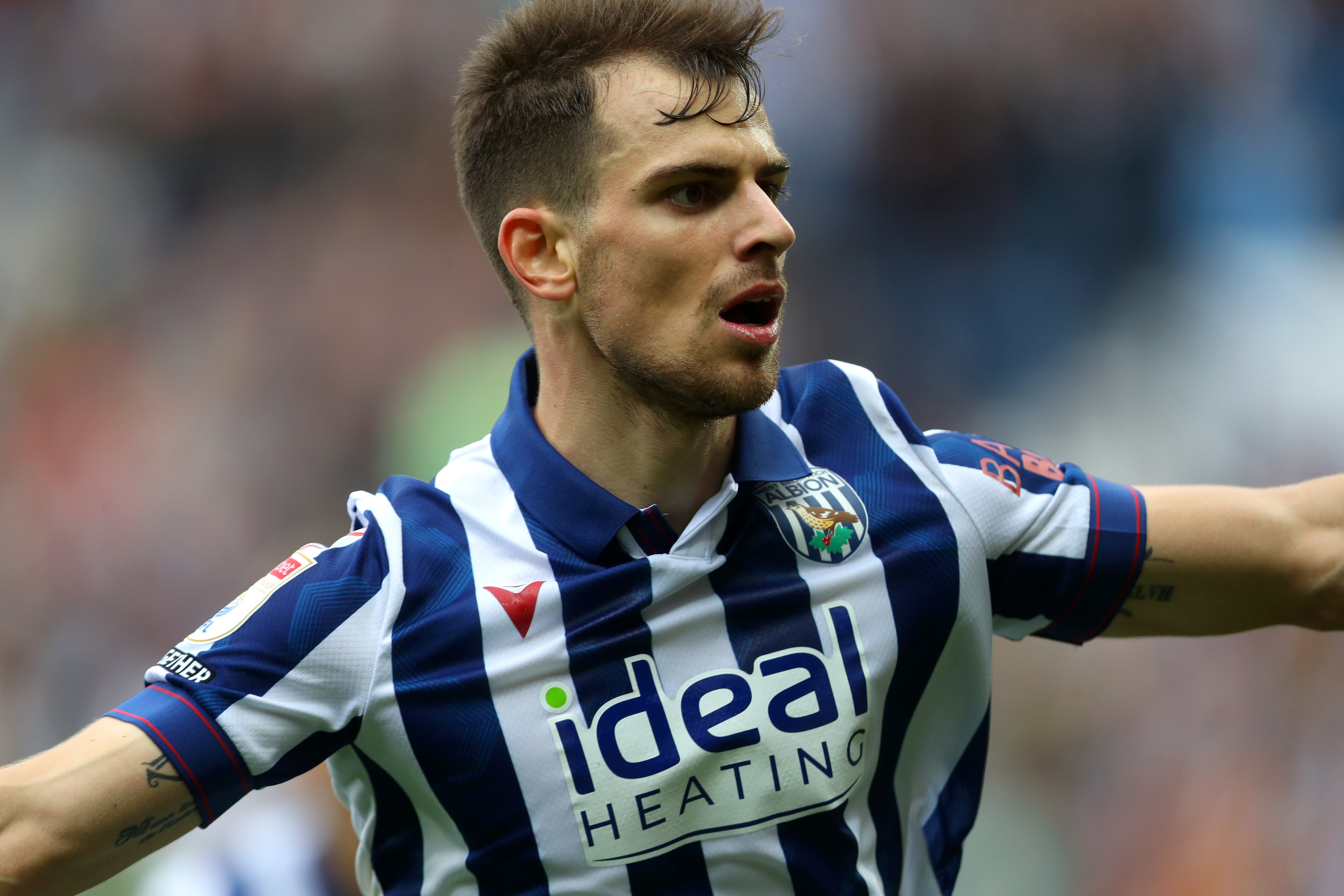 Jayson Molumby celebrates scoring against Swansea 