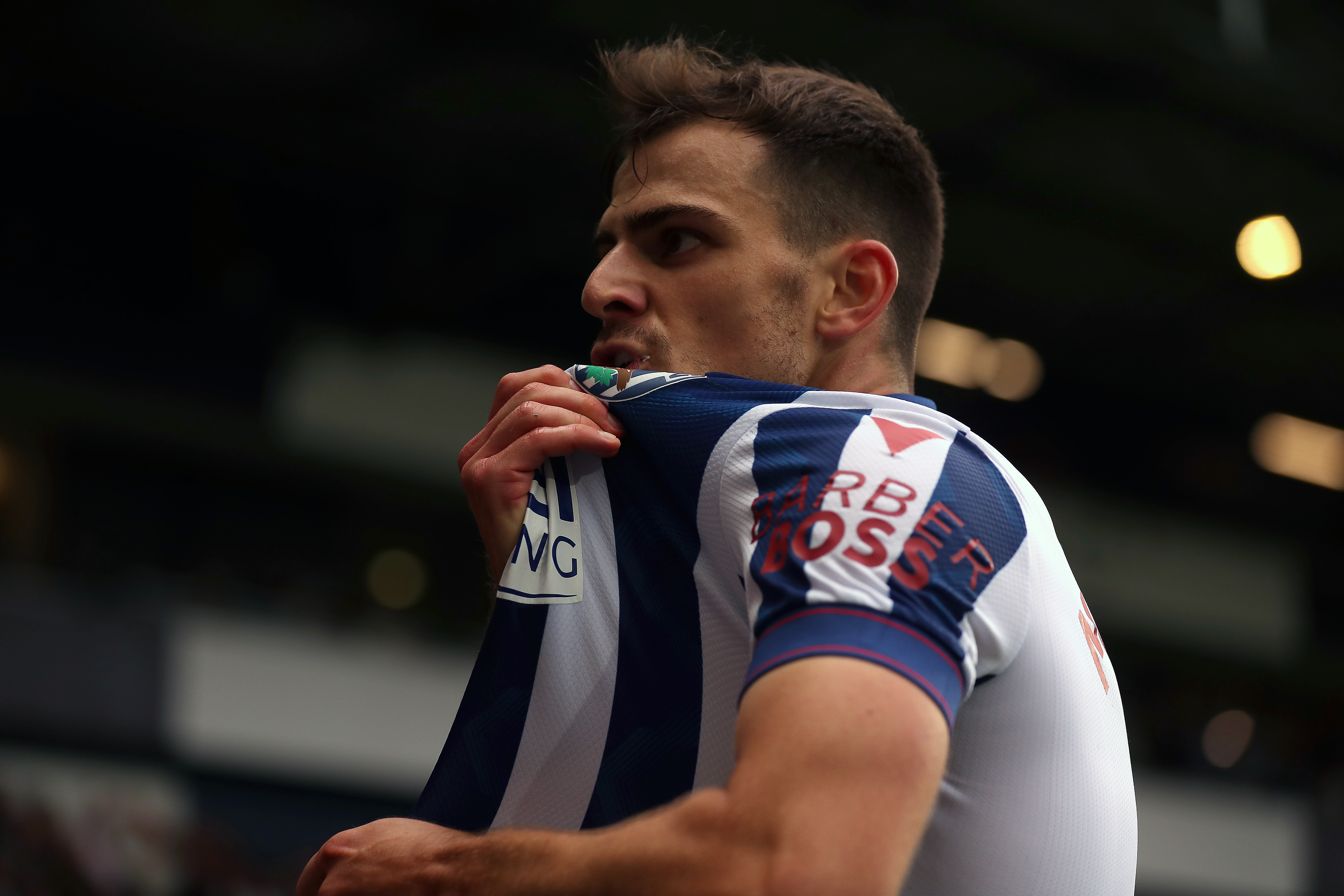 Jayson Molumby celebrates scoring against Swansea 