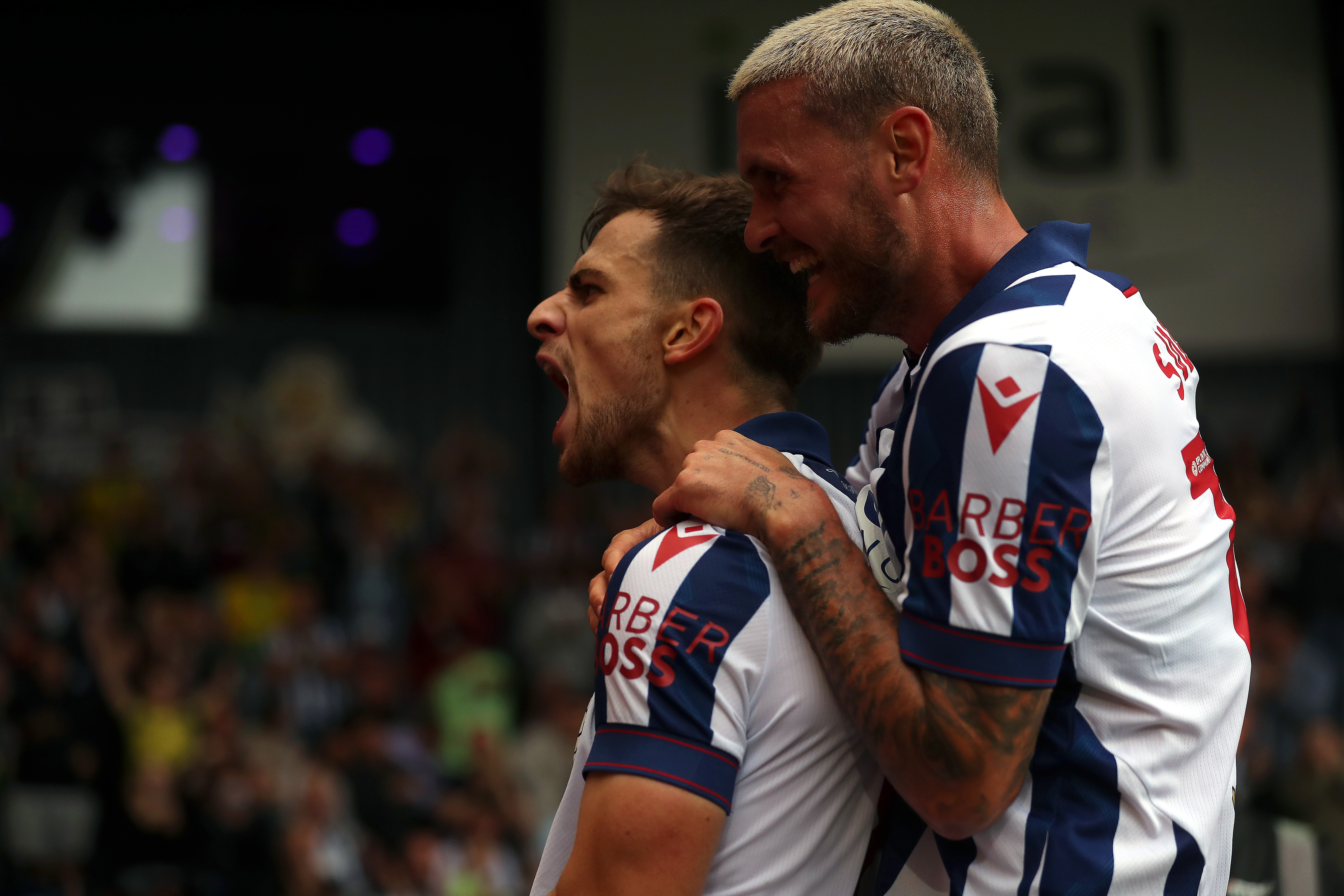 Jayson Molumby celebrates scoring against Swansea 