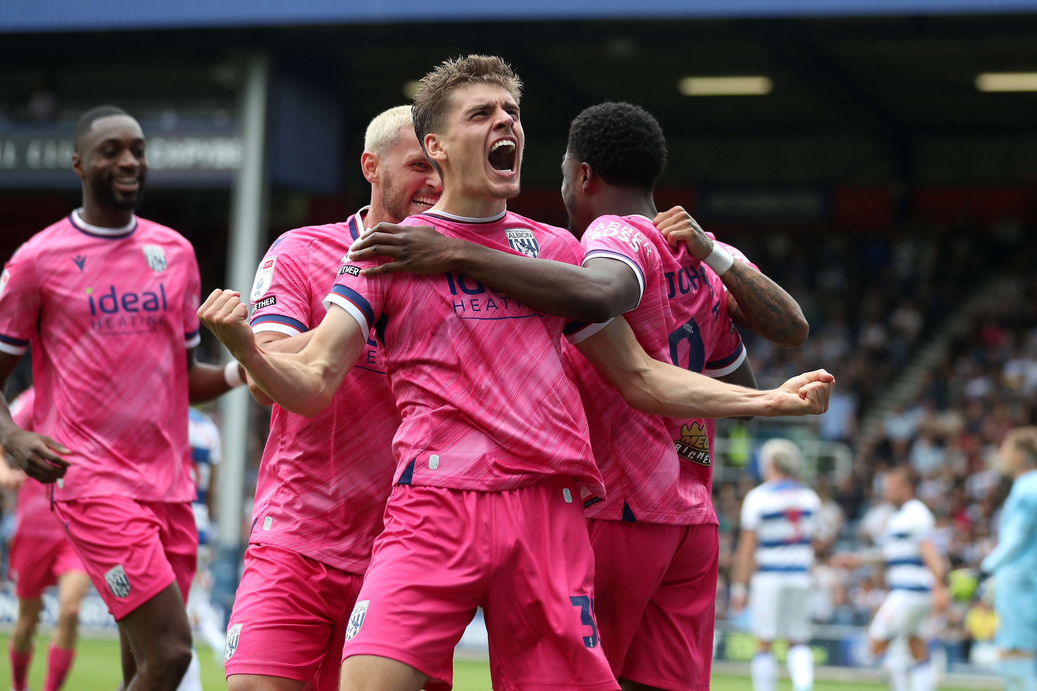 Josh Maja celebrates scoring his second goal at QPR with team-mates