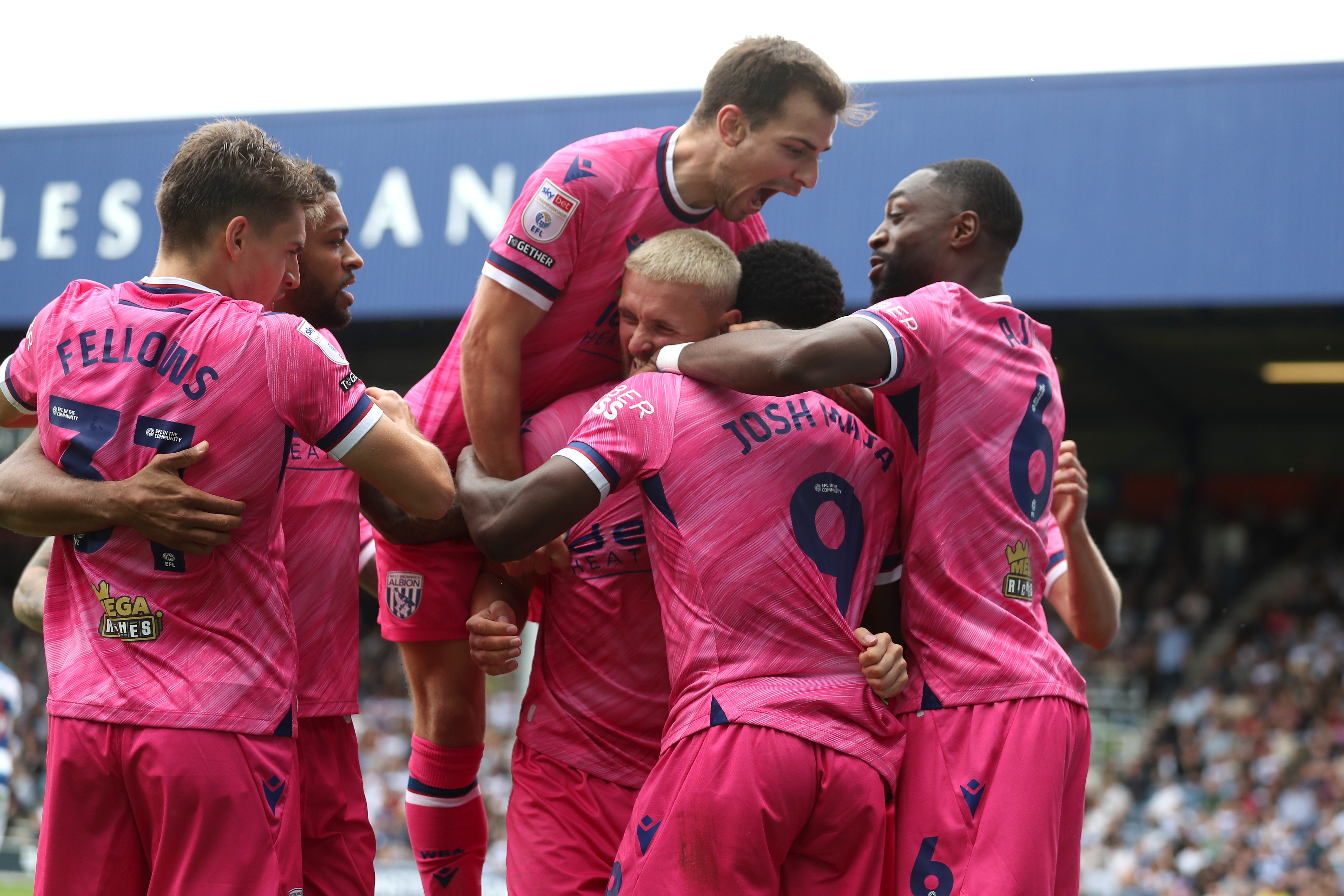 Josh Maja celebrates scoring his second goal at QPR with team-mates