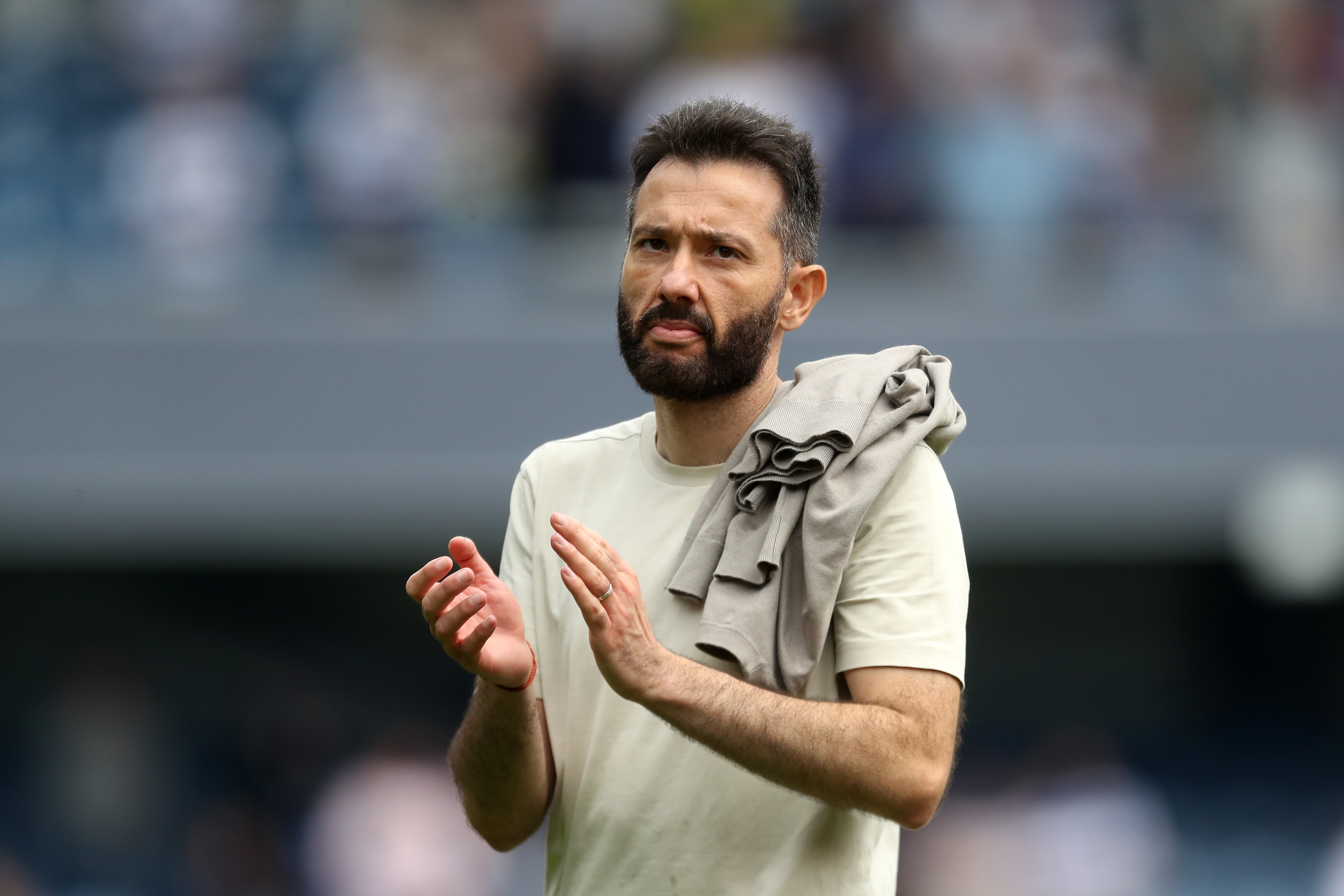 Carlos Corberán applauding Albion fans at QPR 