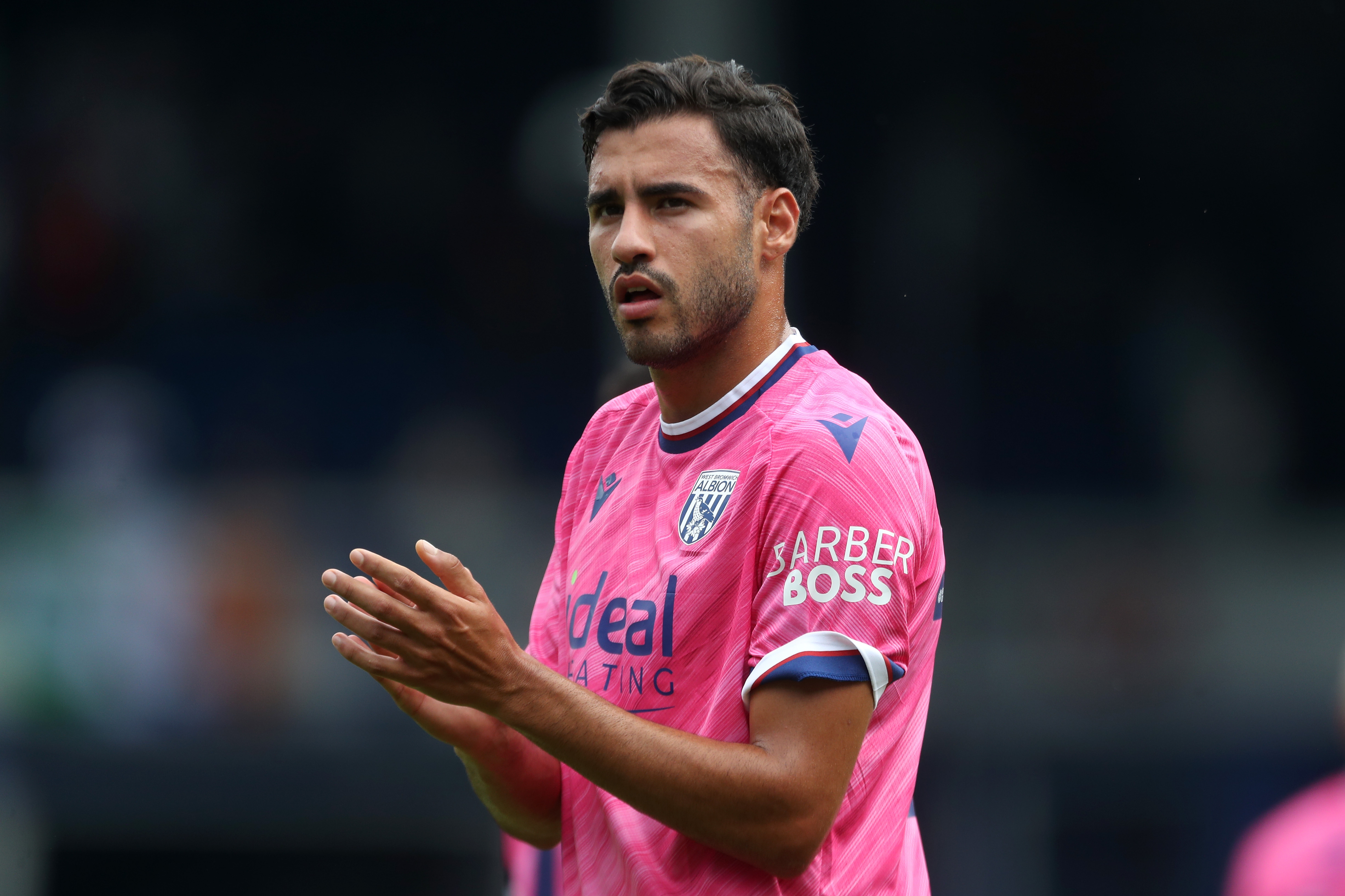 Gianluca Frabotta applauding Albion fans at QPR 