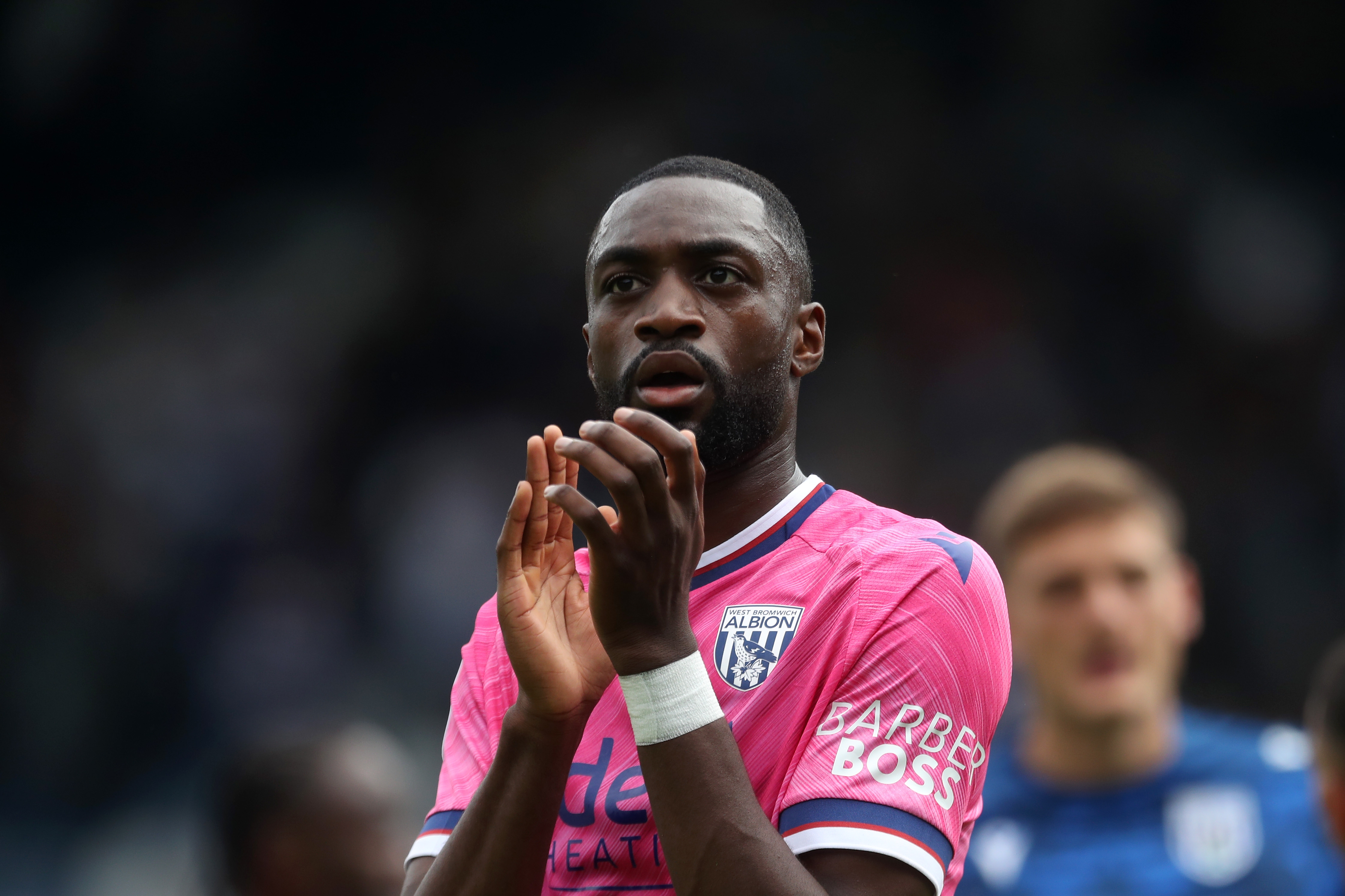 Semi Ajayi applauding Albion fans at QPR 