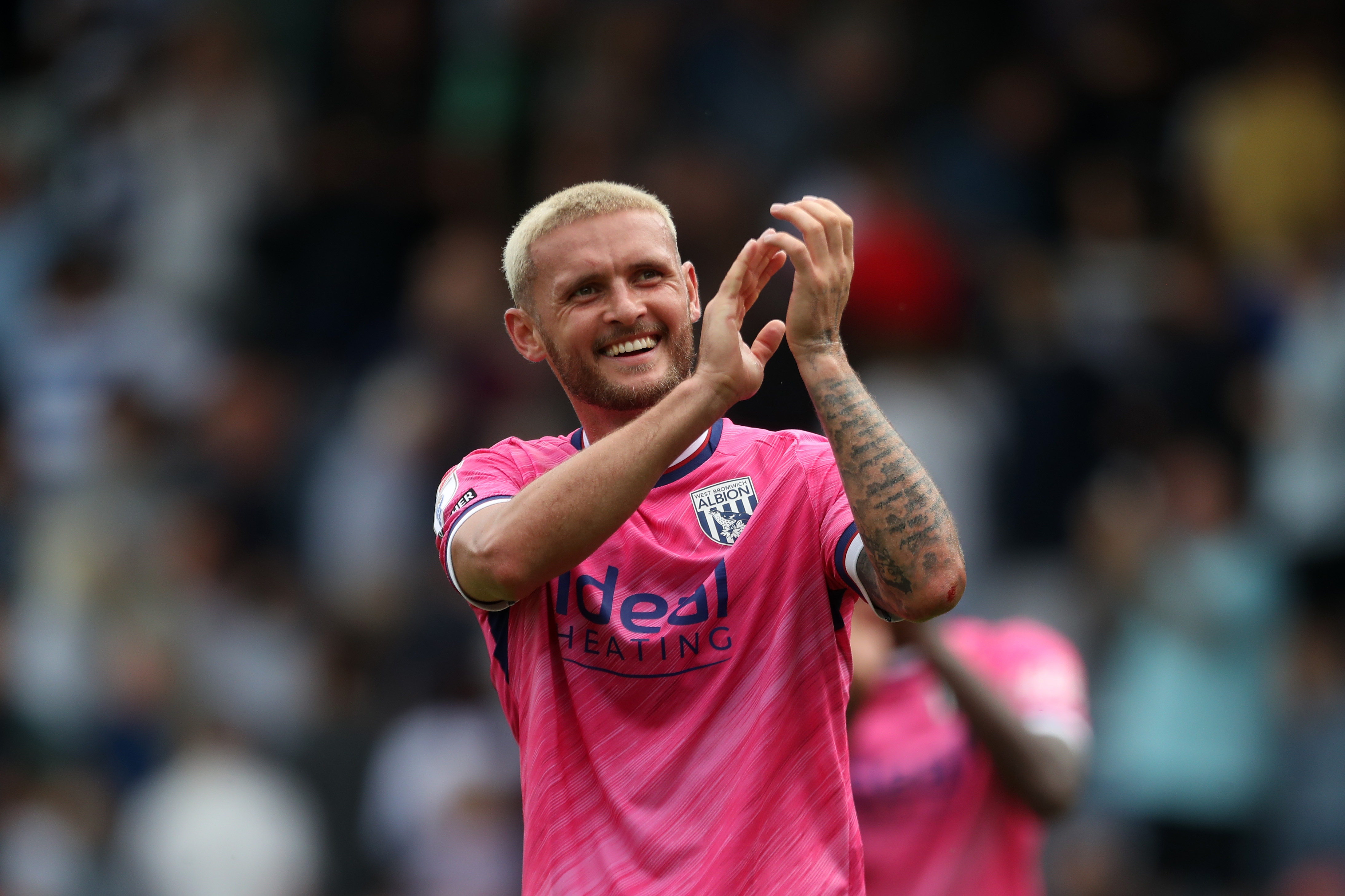 John Swift applauding Albion fans at QPR 