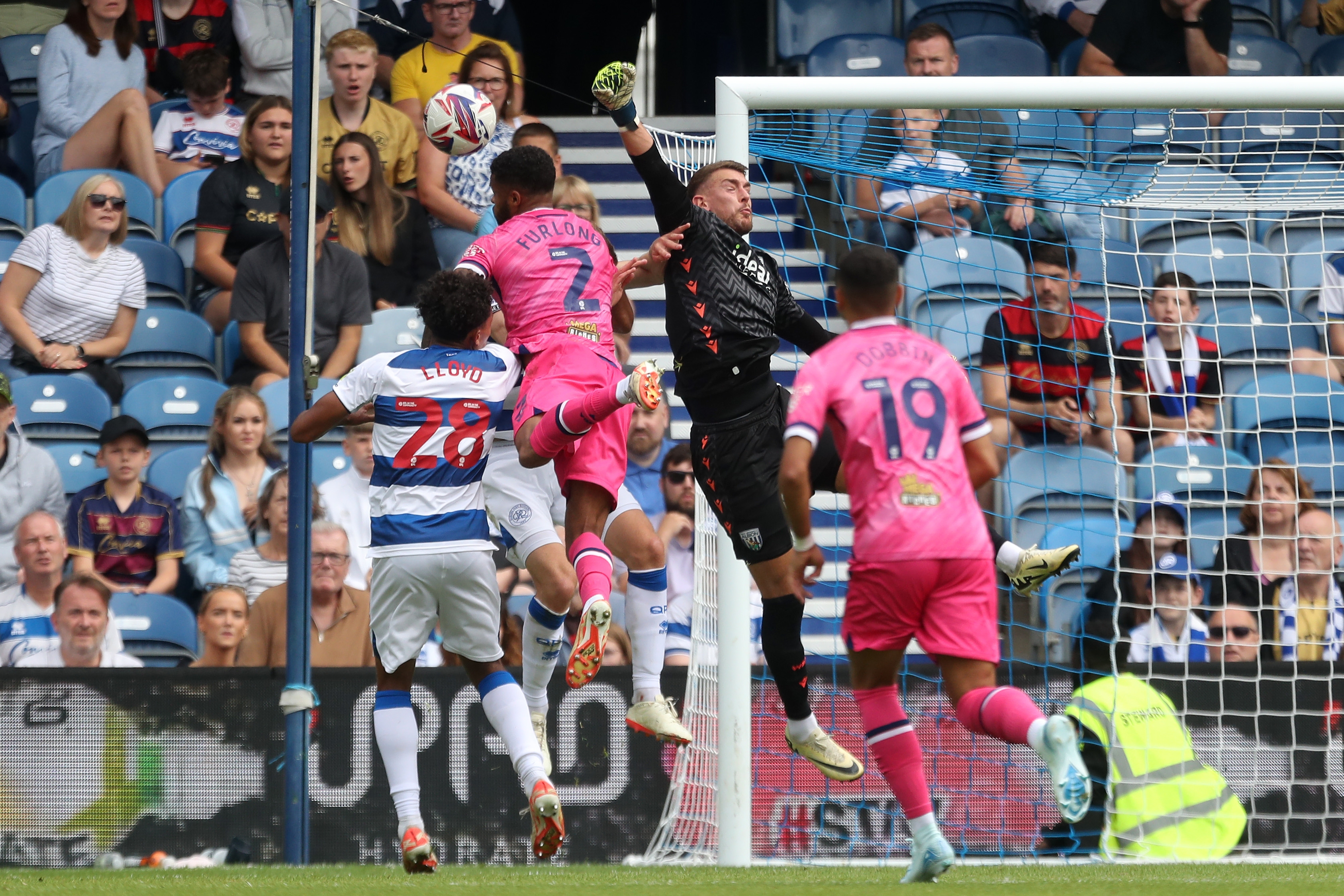 Alex Palmer punching the ball away at QPR 