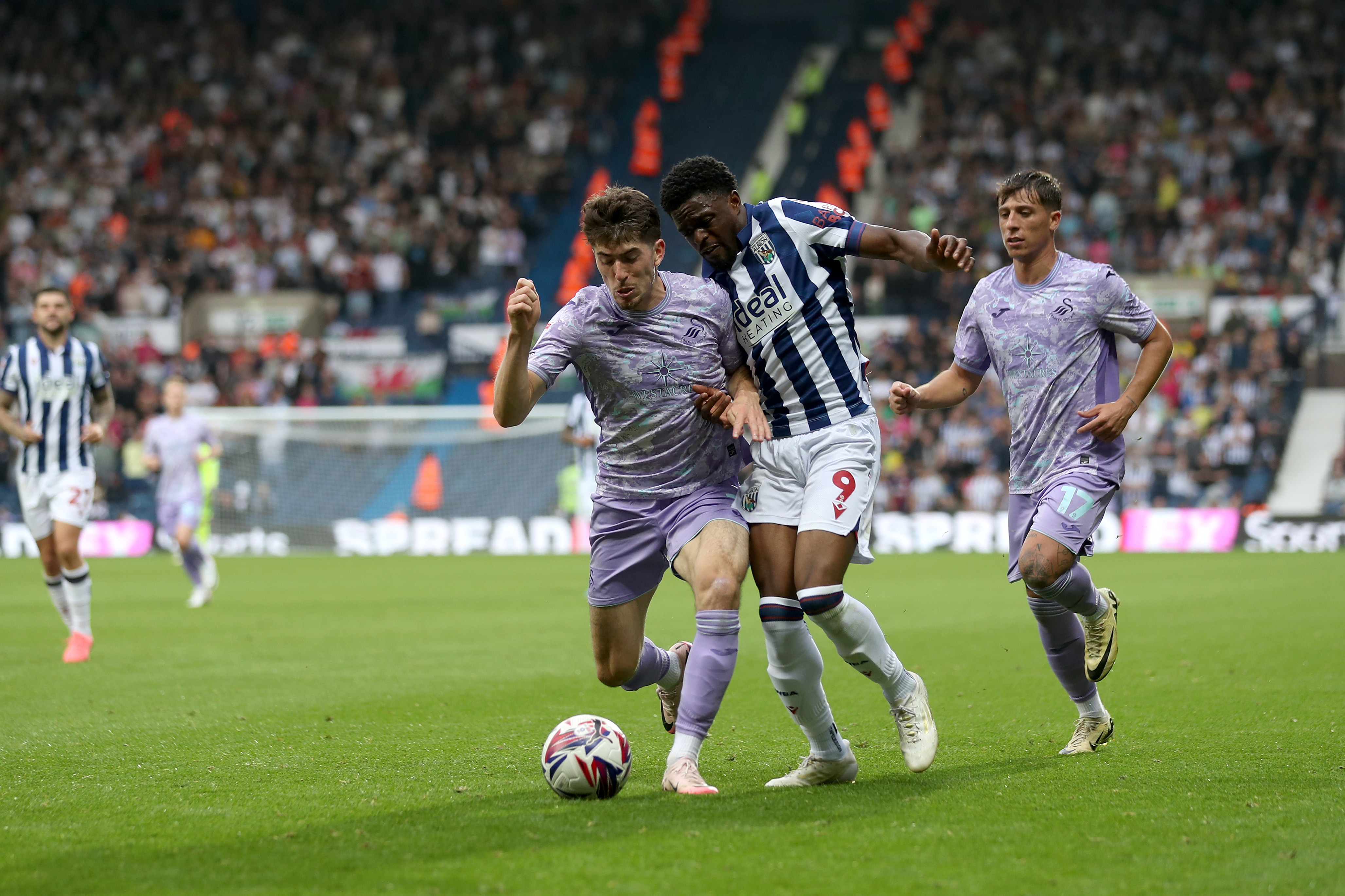 Karlan Grant on the ball against Swansea 