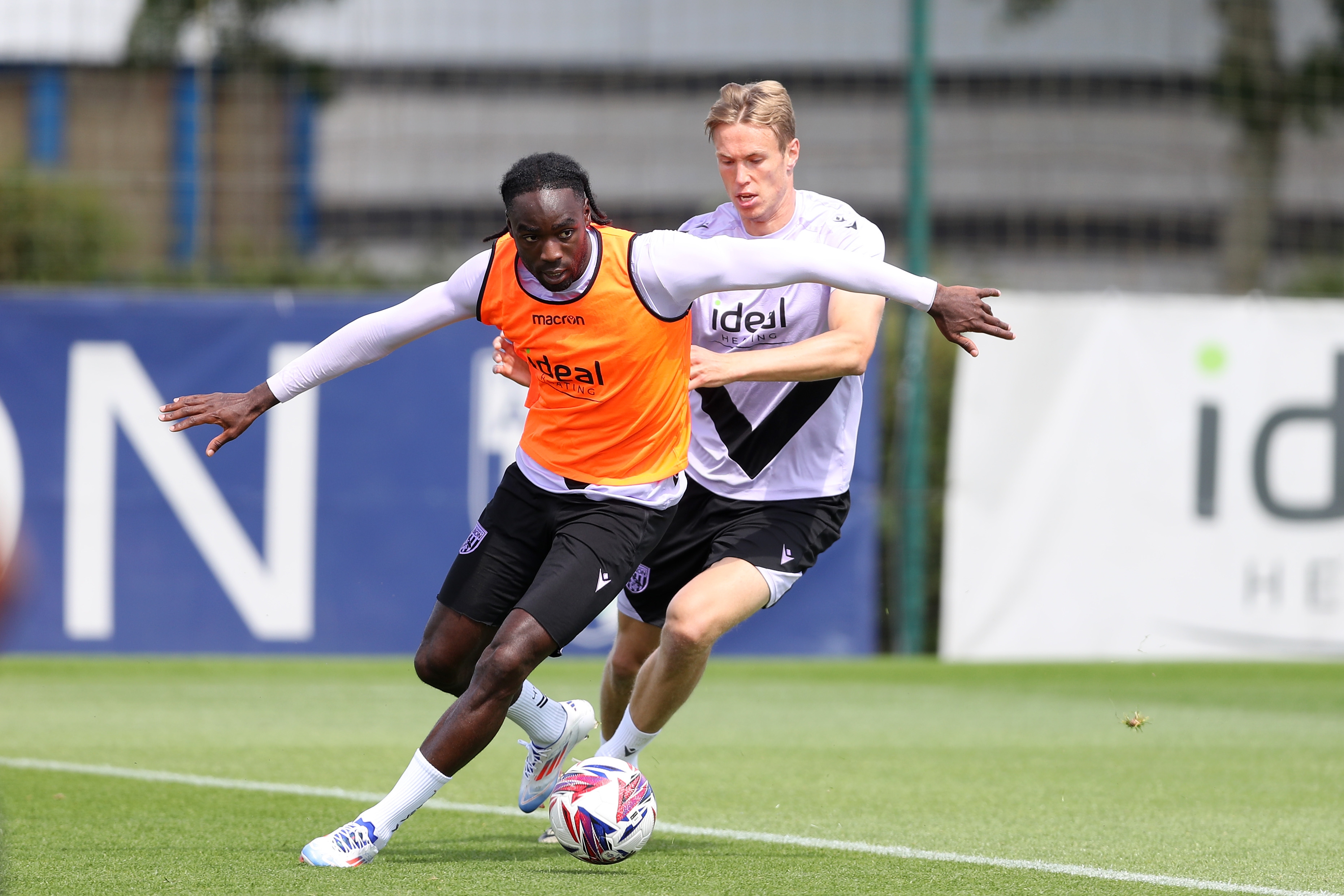 Devante Cole and Torbjørn Heggem fighting for the ball during training 