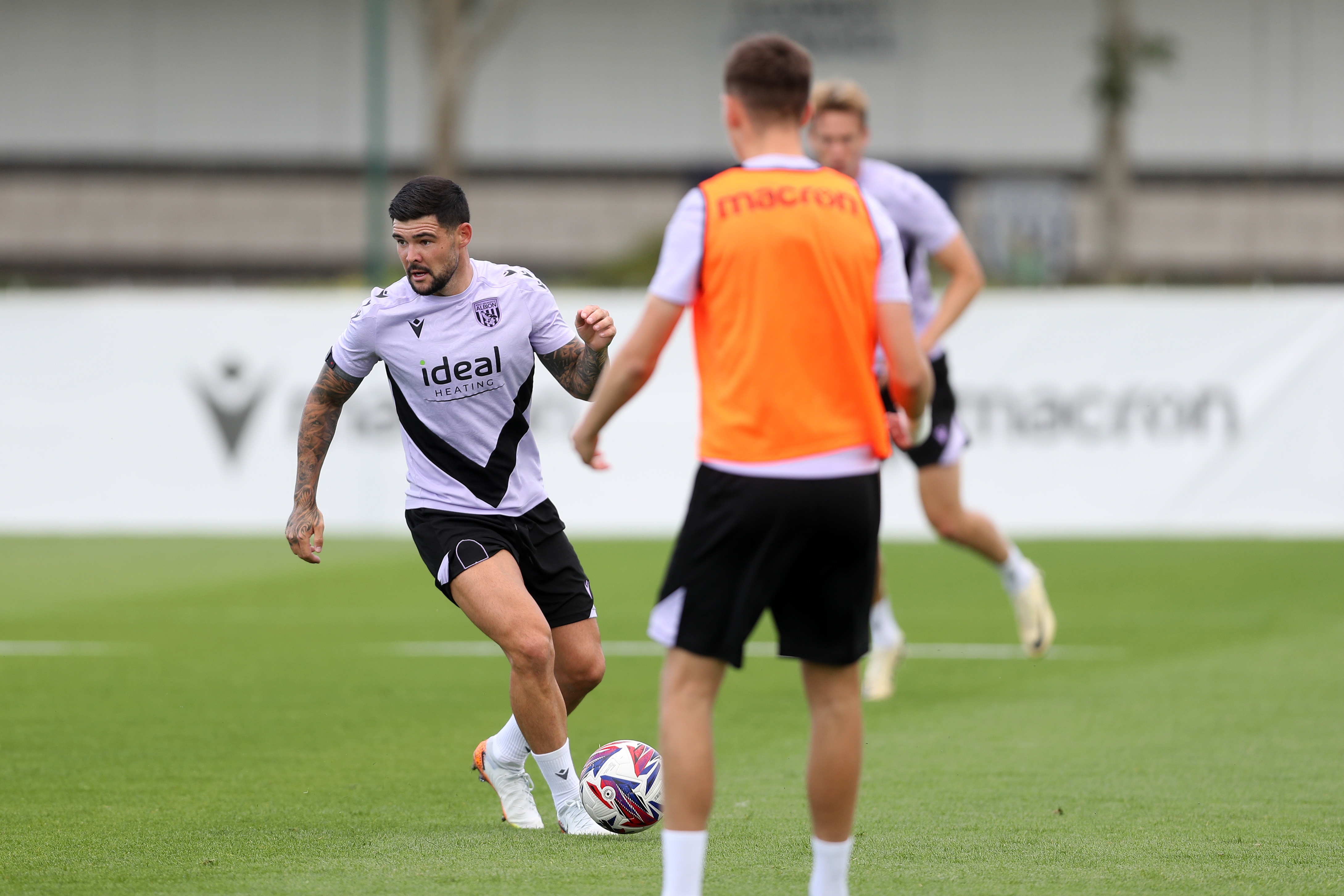 Alex Mowatt on the ball during training 