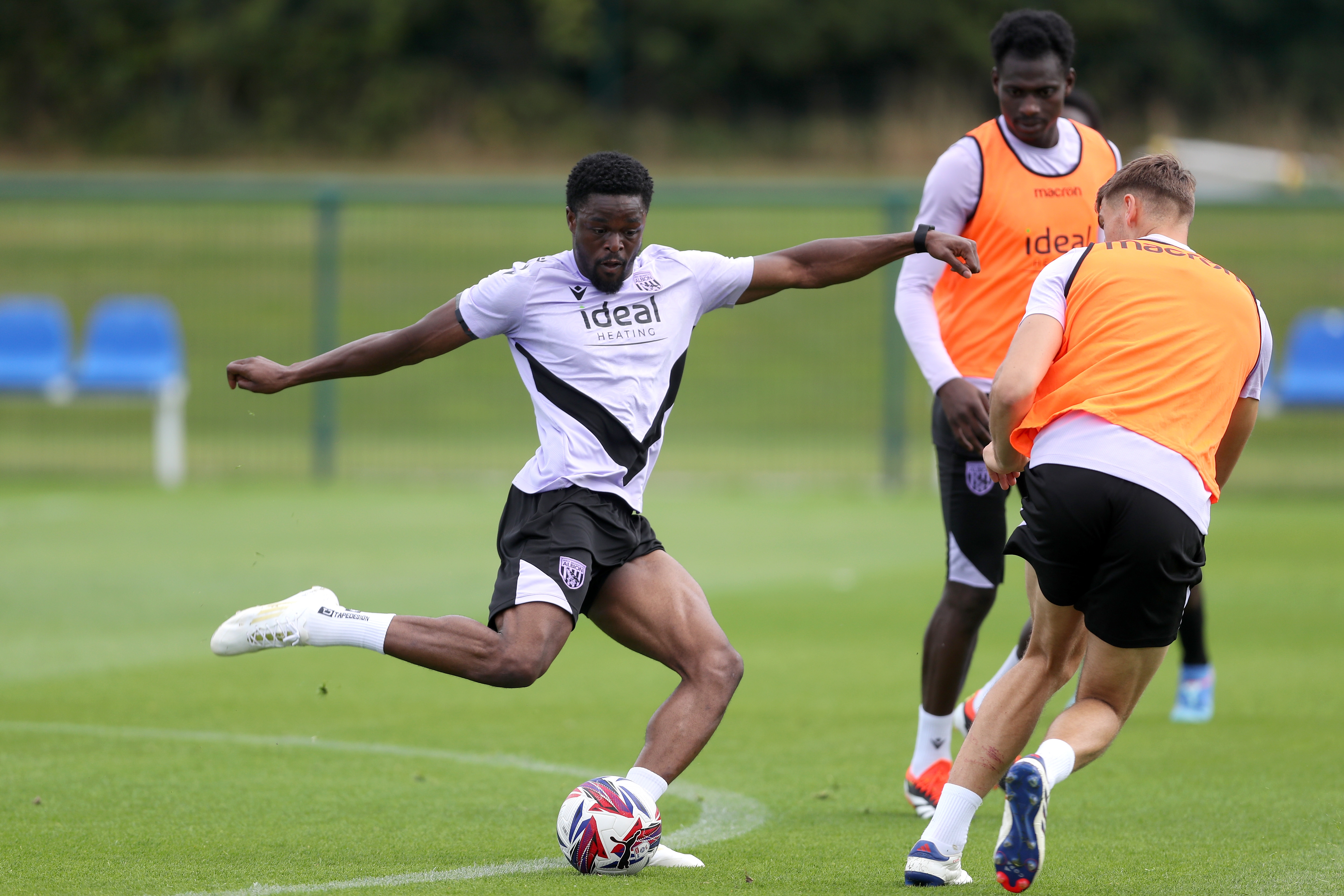 Josh Maja striking the ball during training 