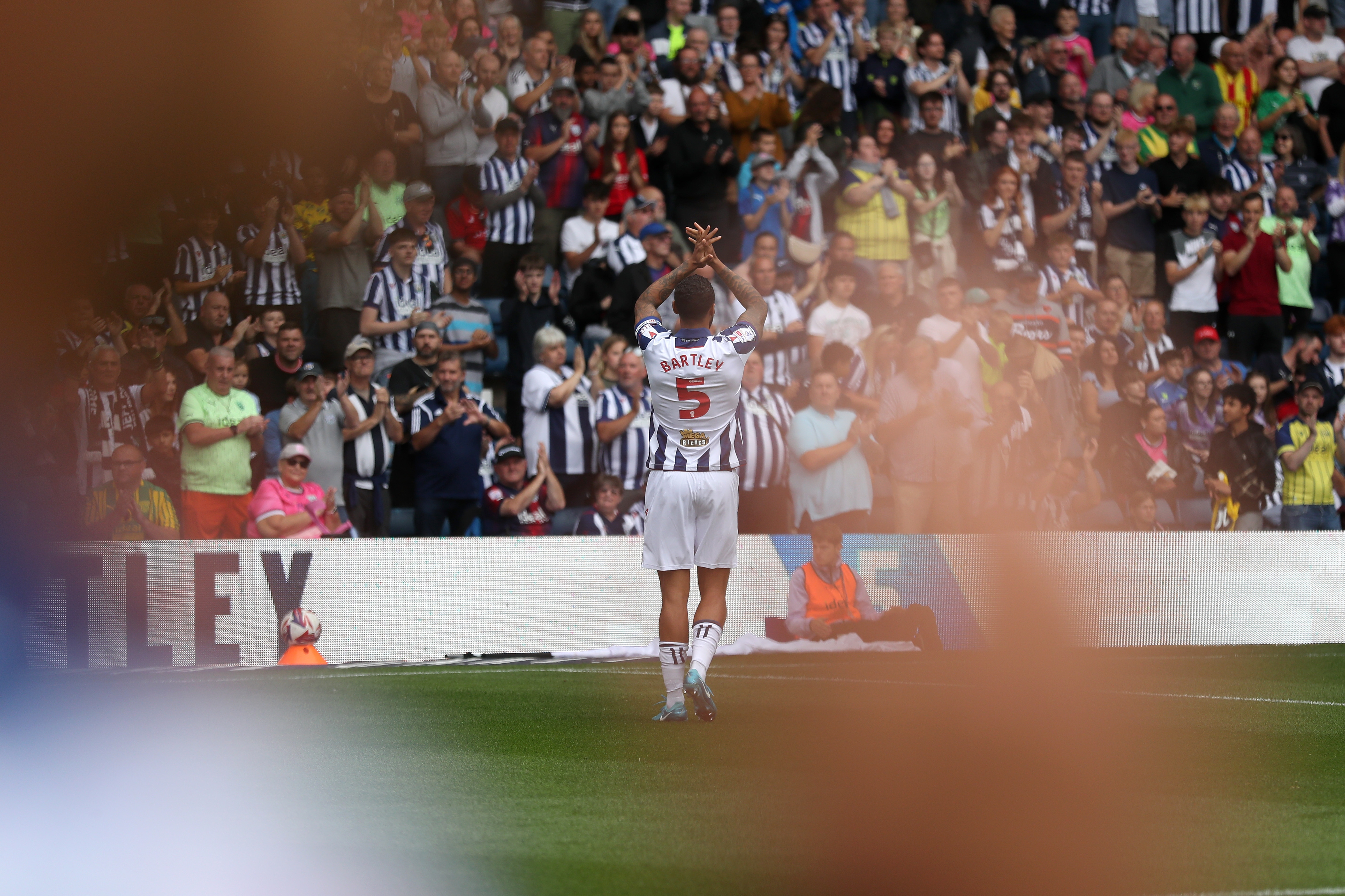 Kyle Bartley applauding Albion fans after the game against Swansea 