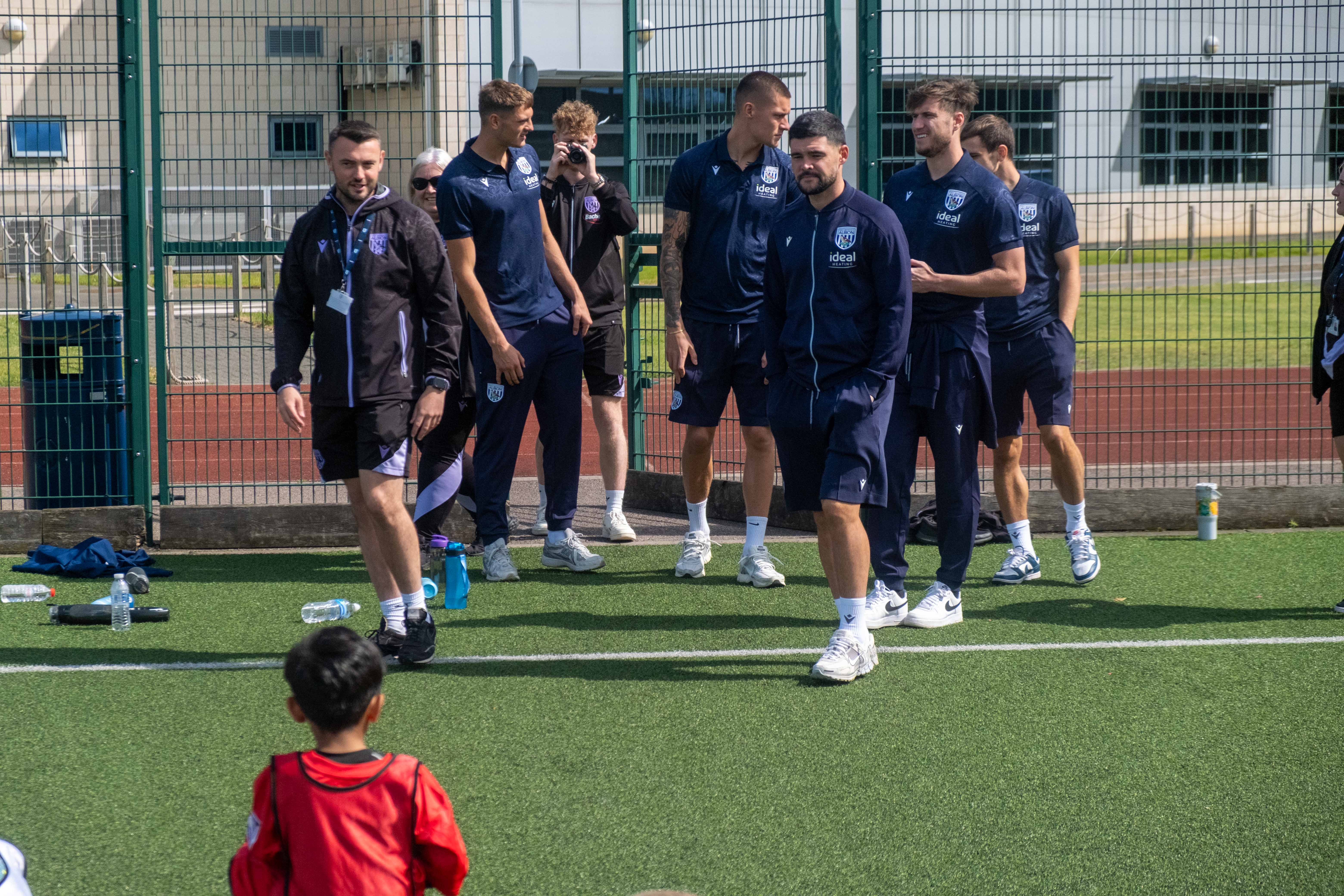 Albion players arrive at Sandwell Academy.