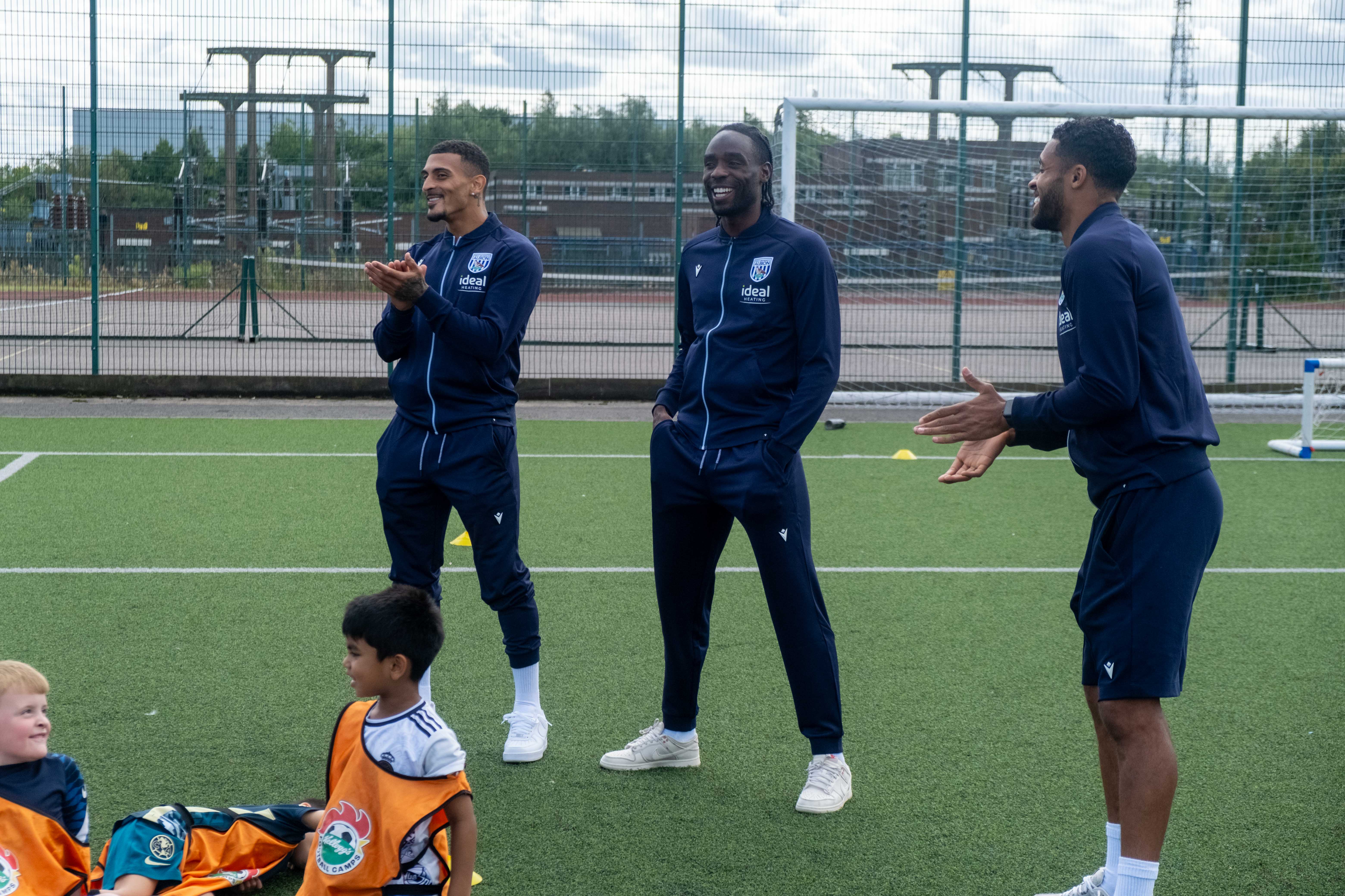 Karlan Grant, Devante Cole and Darnell Furlong answer questions from camp participants.