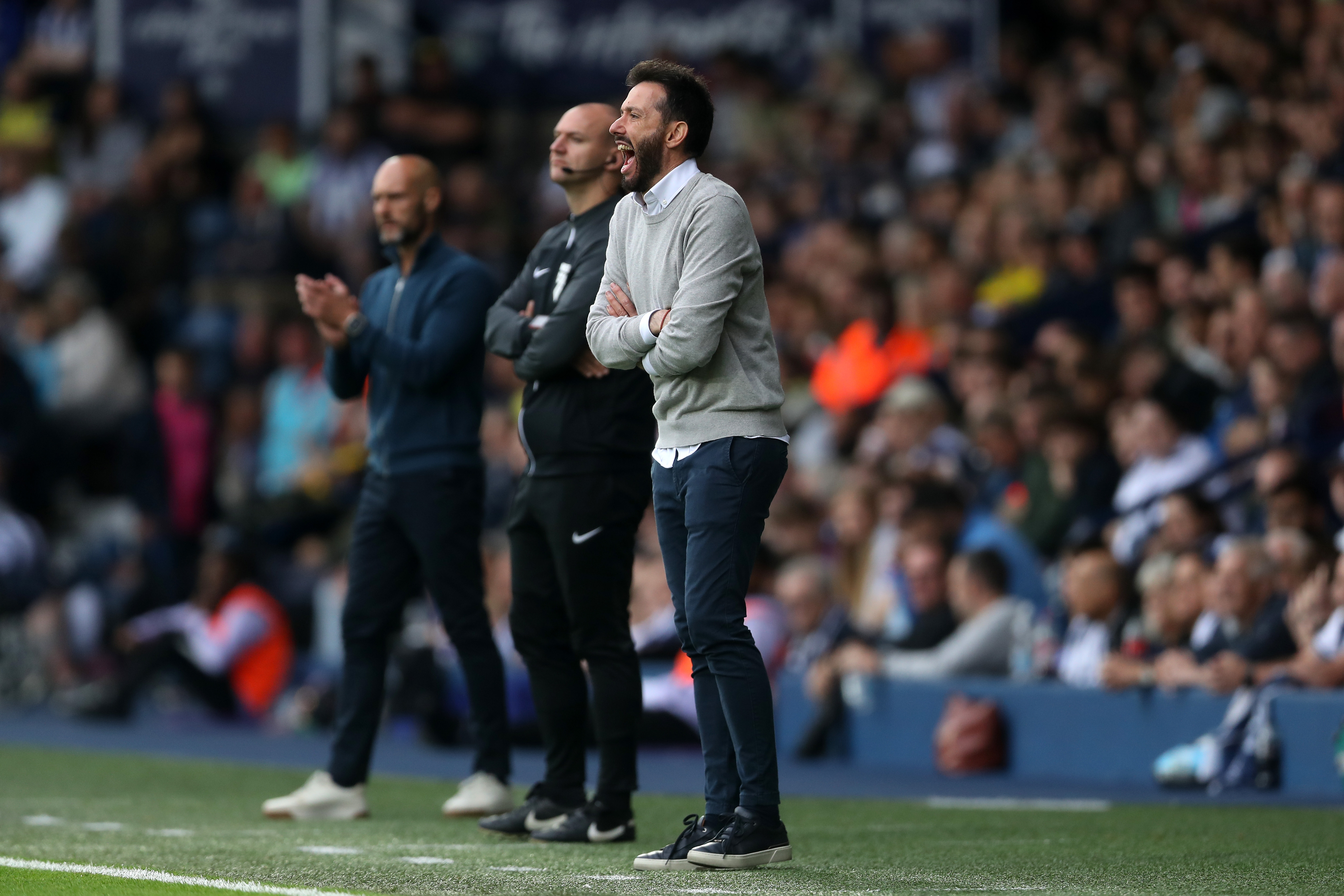 Carlos Corberán shouting at players on the side of the pitch at The Hawthorns in the game against Swansea 