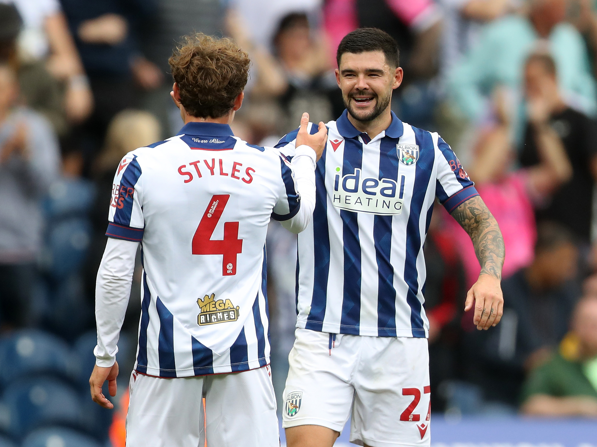 Alex Mowatt and Callum Styles shake hands after the Swansea game 