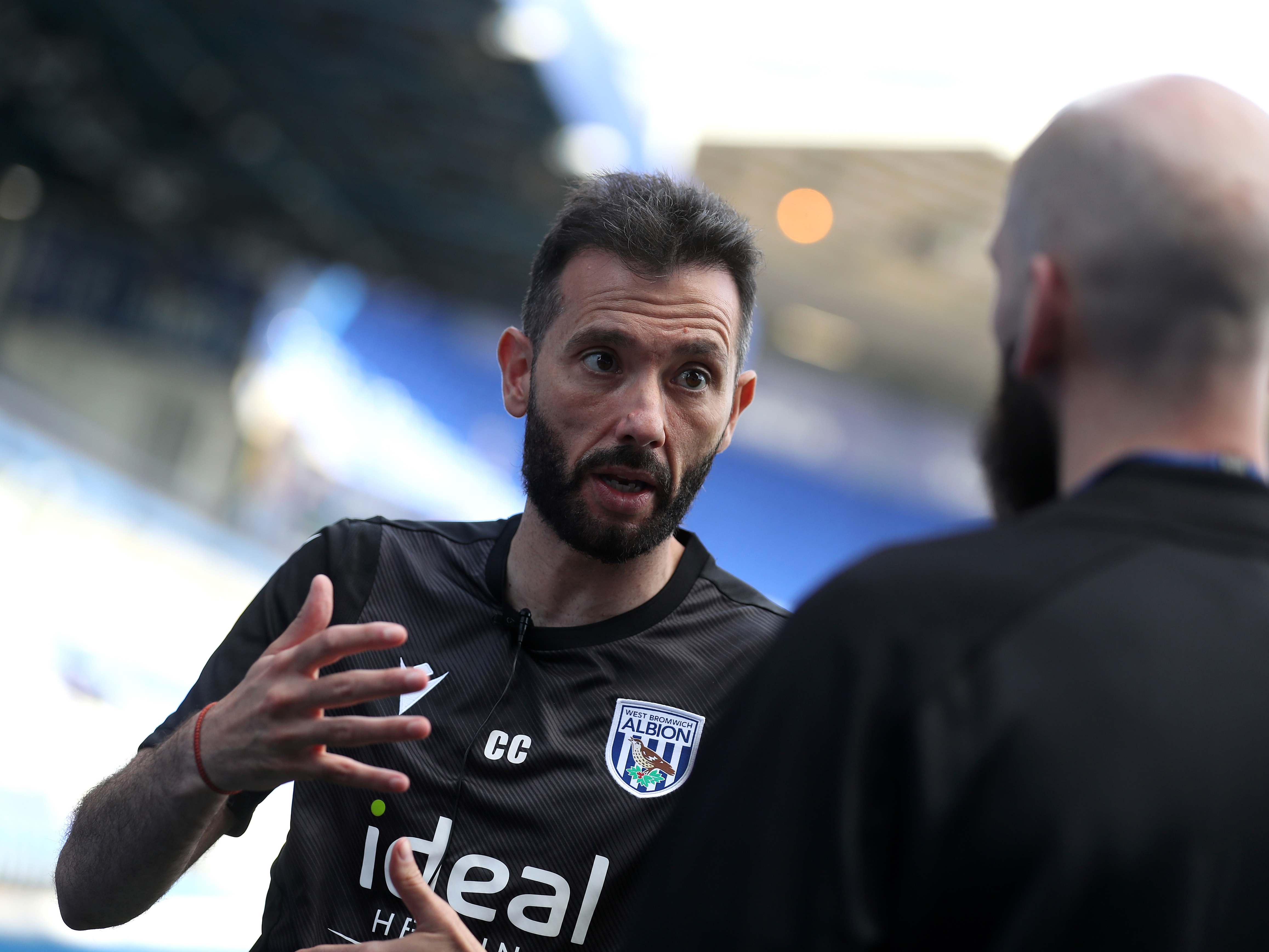 An image of Carlos Corberán being interview by WBA TV