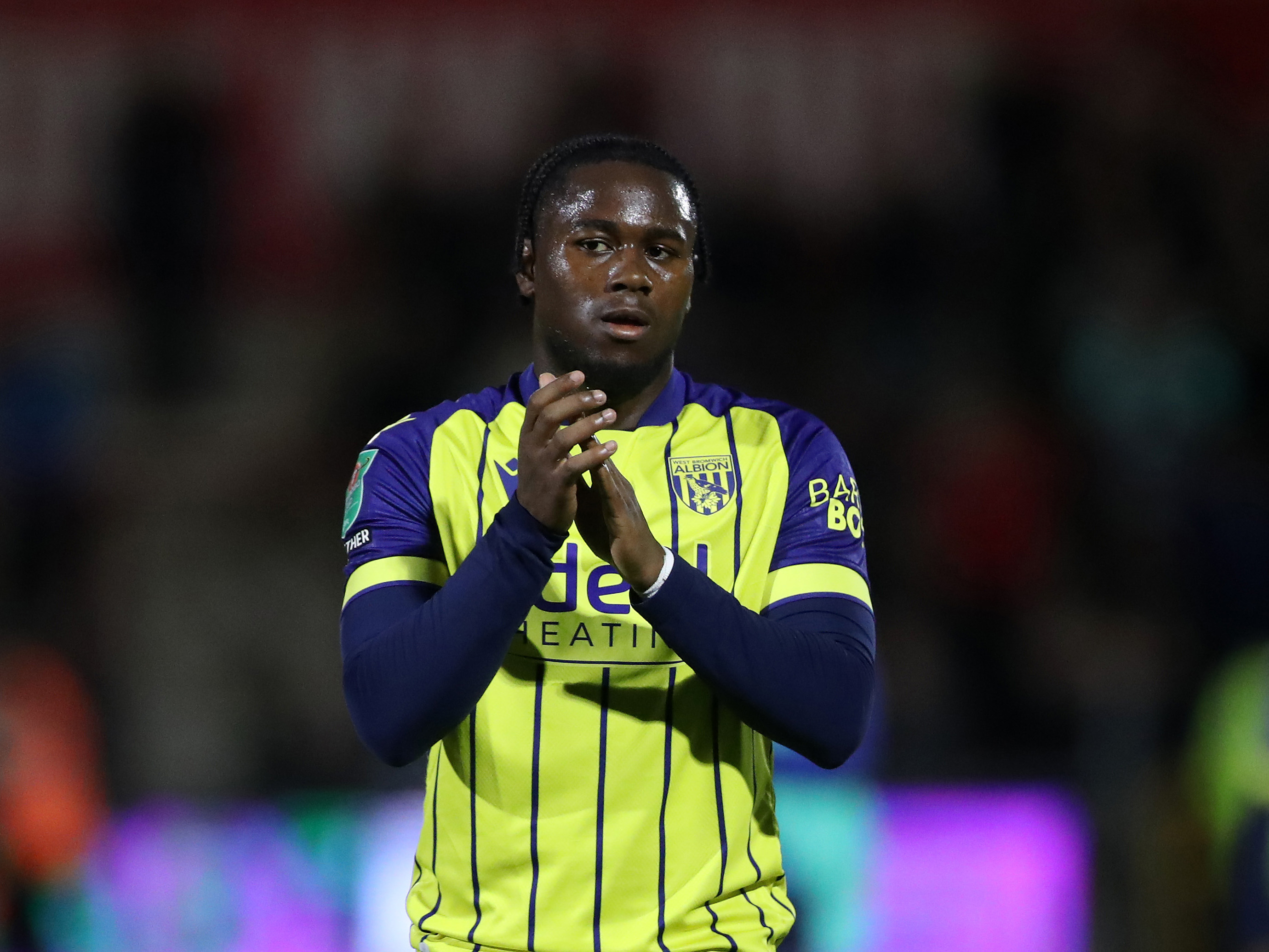 A photo of Reyes Cleary in Albion's 2024/25 yellow and blue away kit