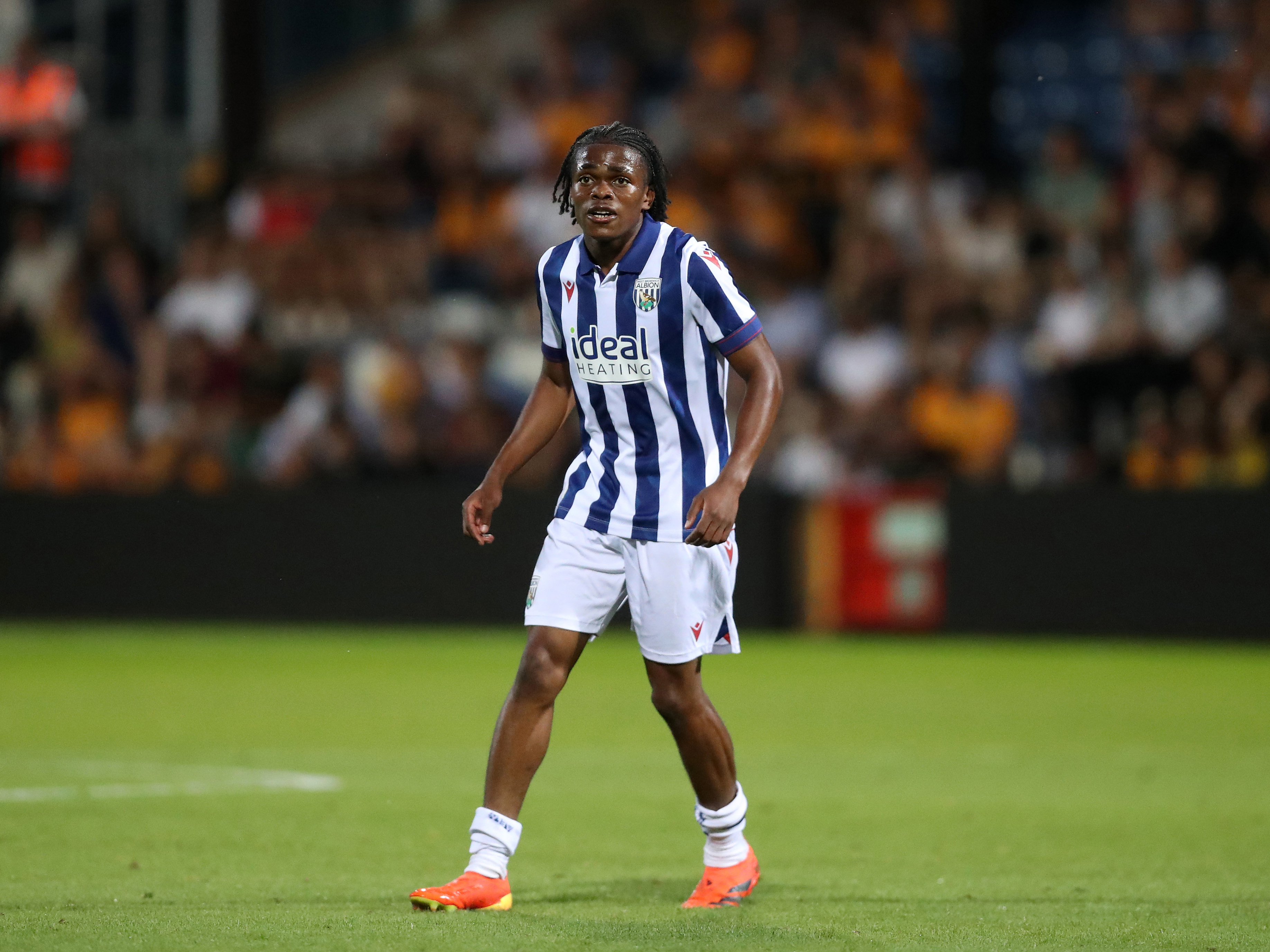 A photo of Albion youngster Divine Onyemachi in action during the 2024/25 pre-season match v Cambridge