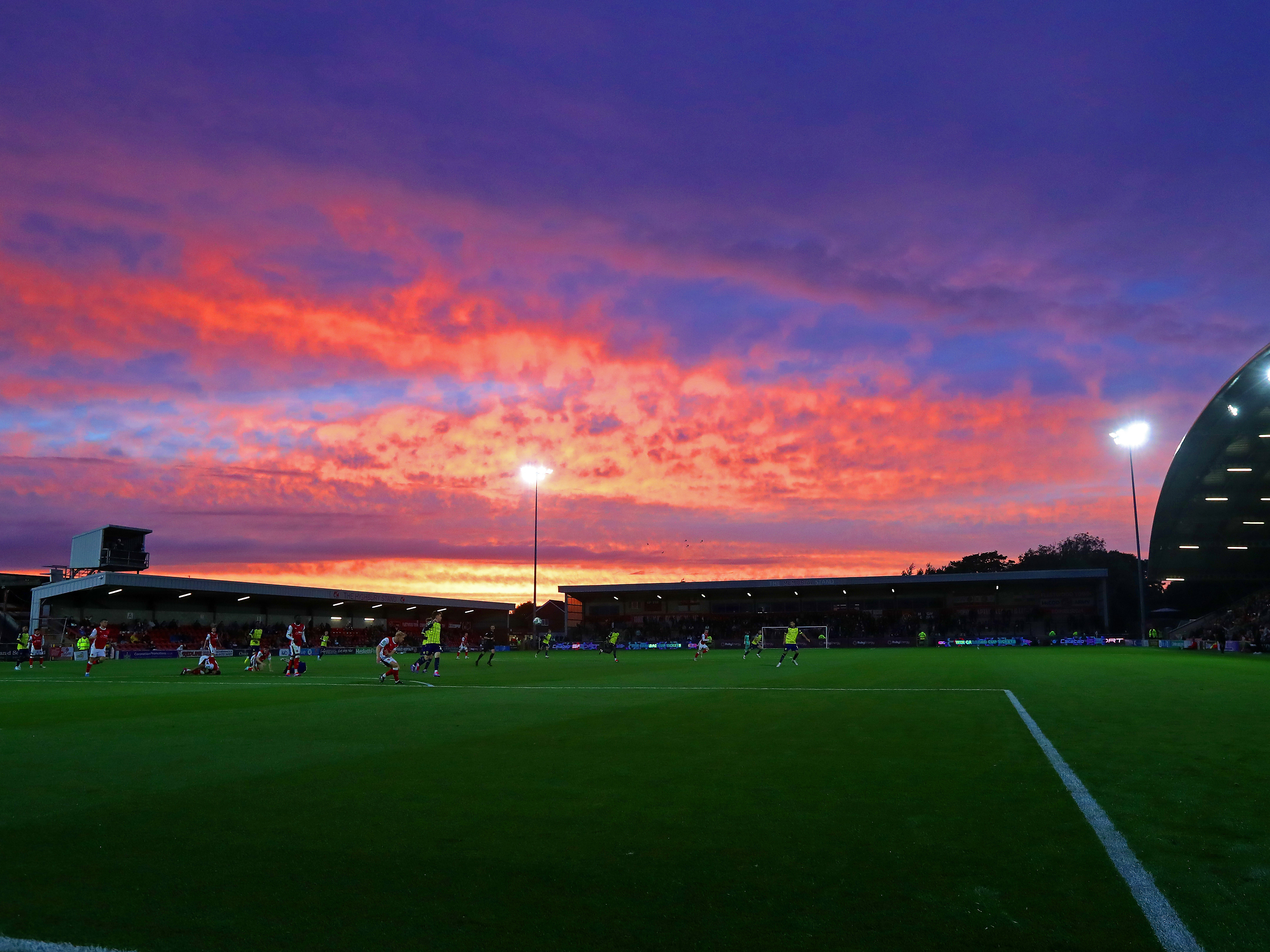 An image of the sun setting on Fleetwood's Highbury Stadium