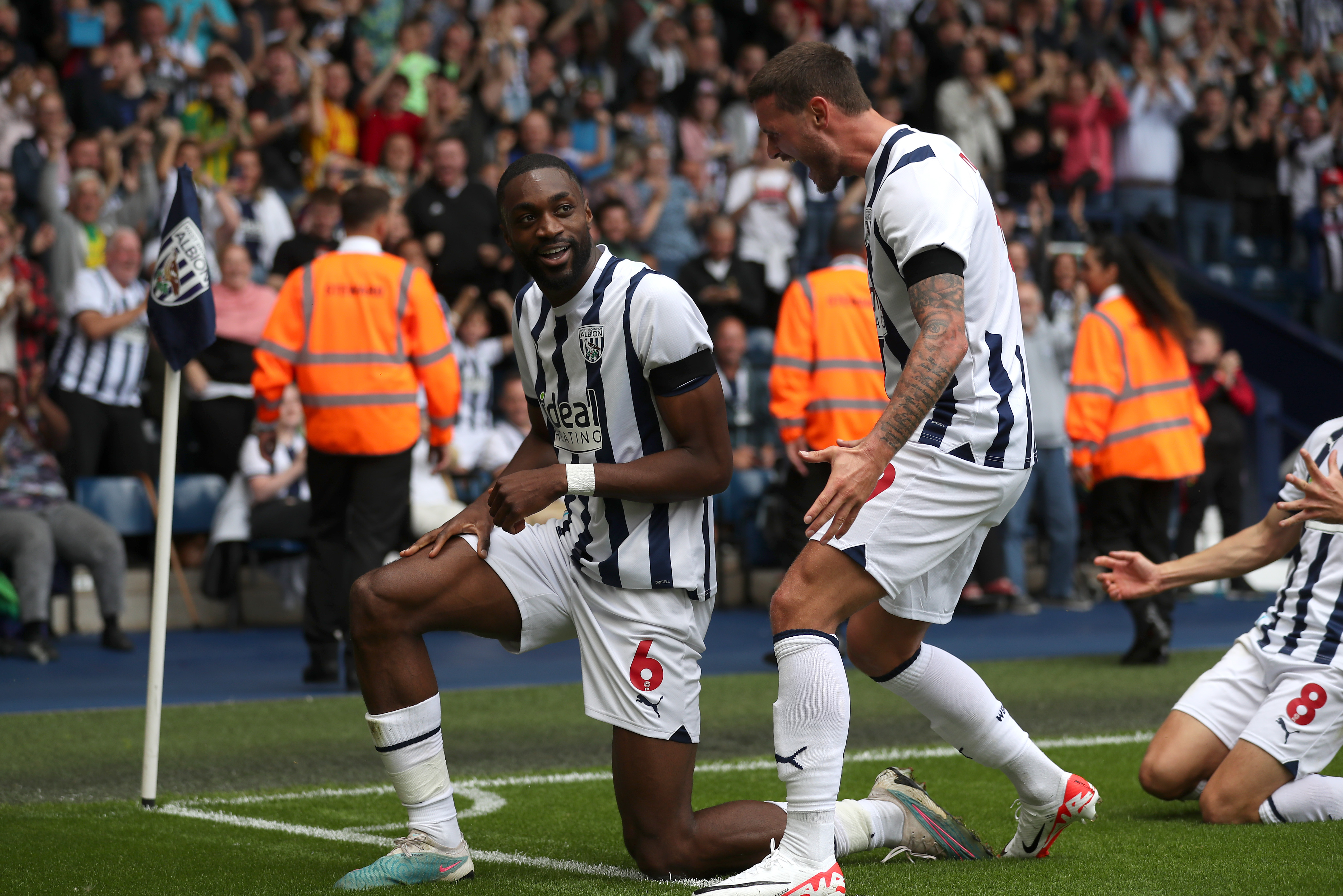 Semi Ajayi celebrates scoring against Swansea at The Hawthorns with John Swift in August 2023