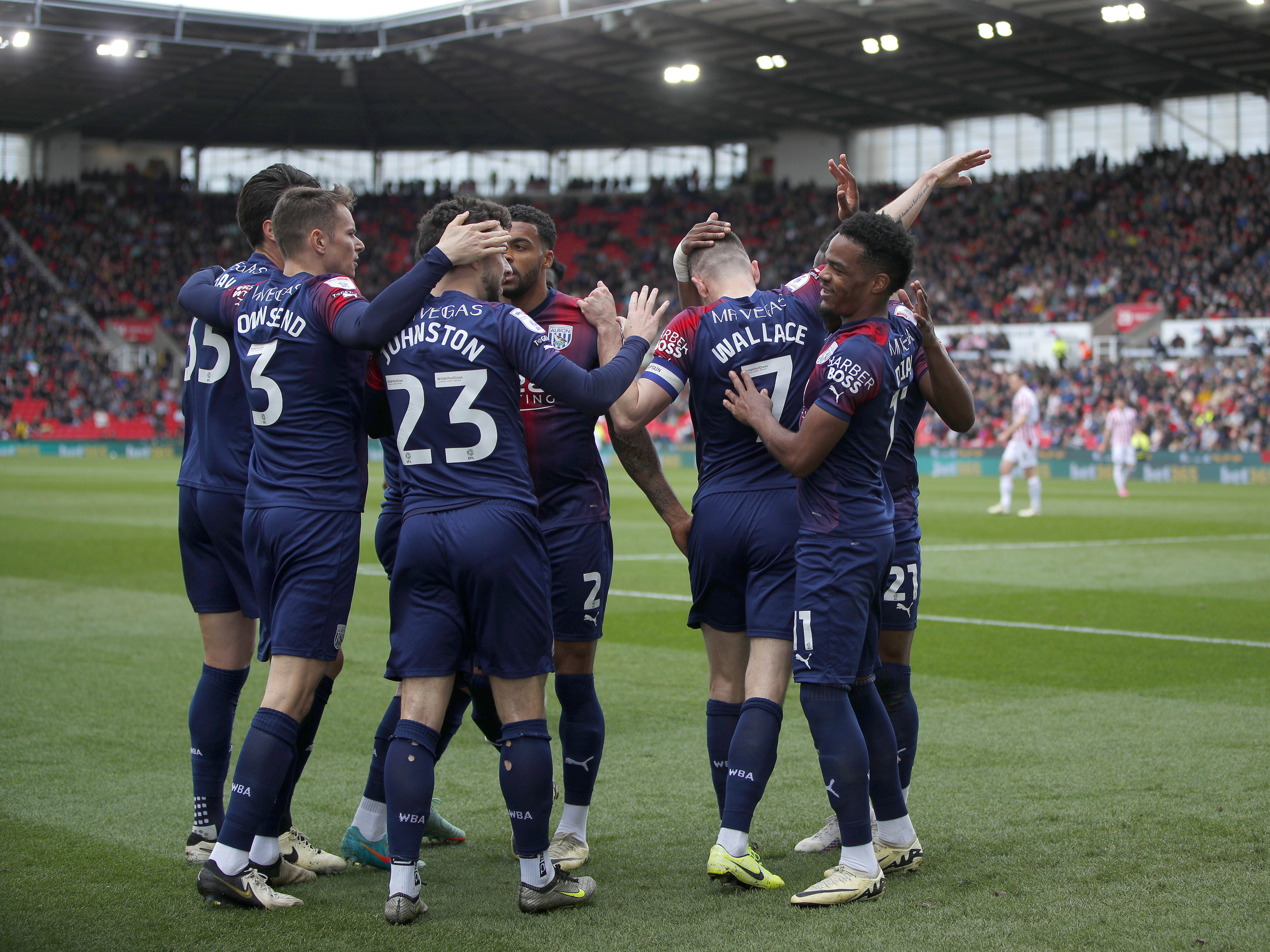 Albion players celebrate at bet365 Stadium following Jed Wallace's goal in April 2024