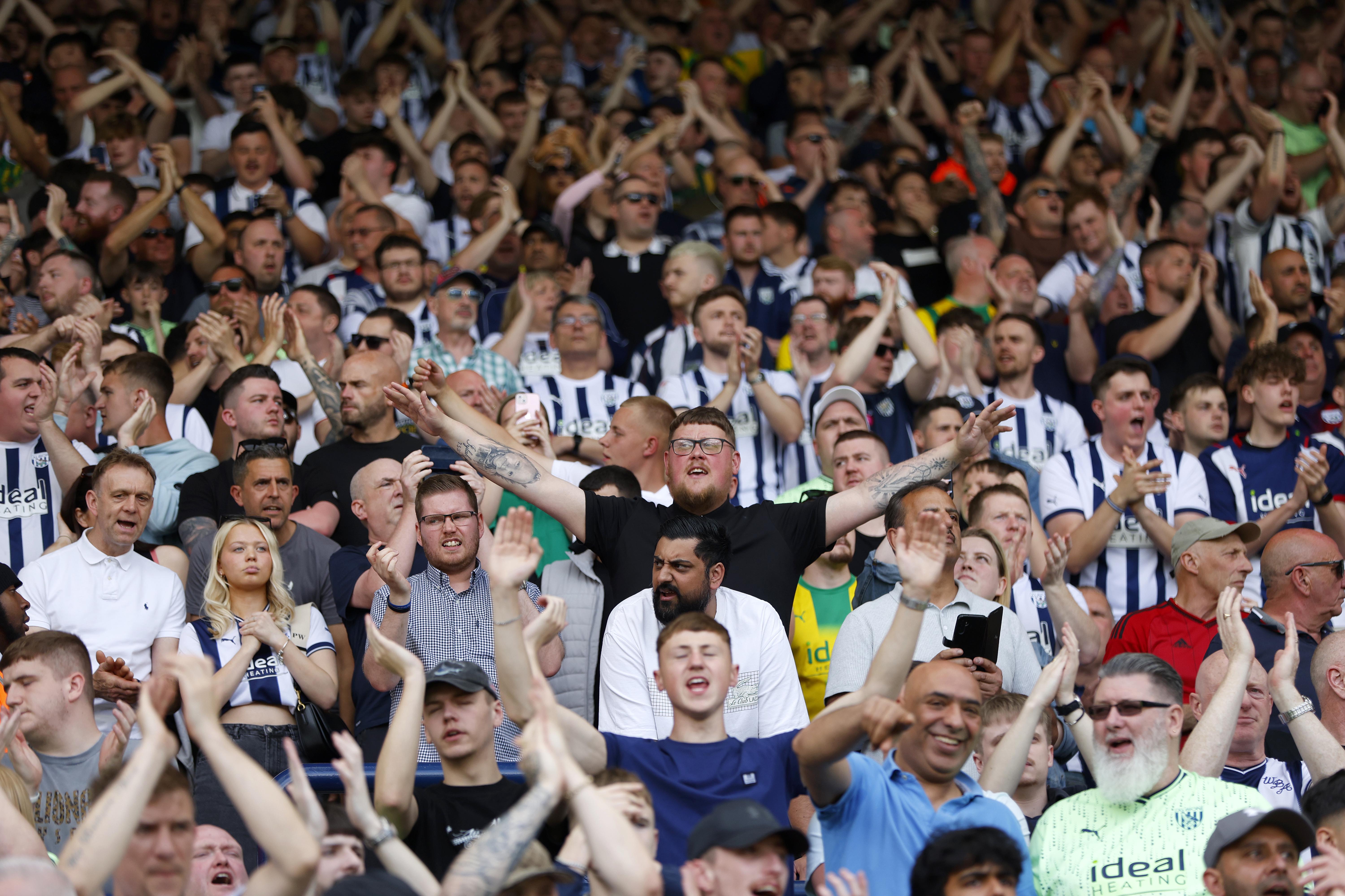 A general view of Albion fans signing songs at a game 