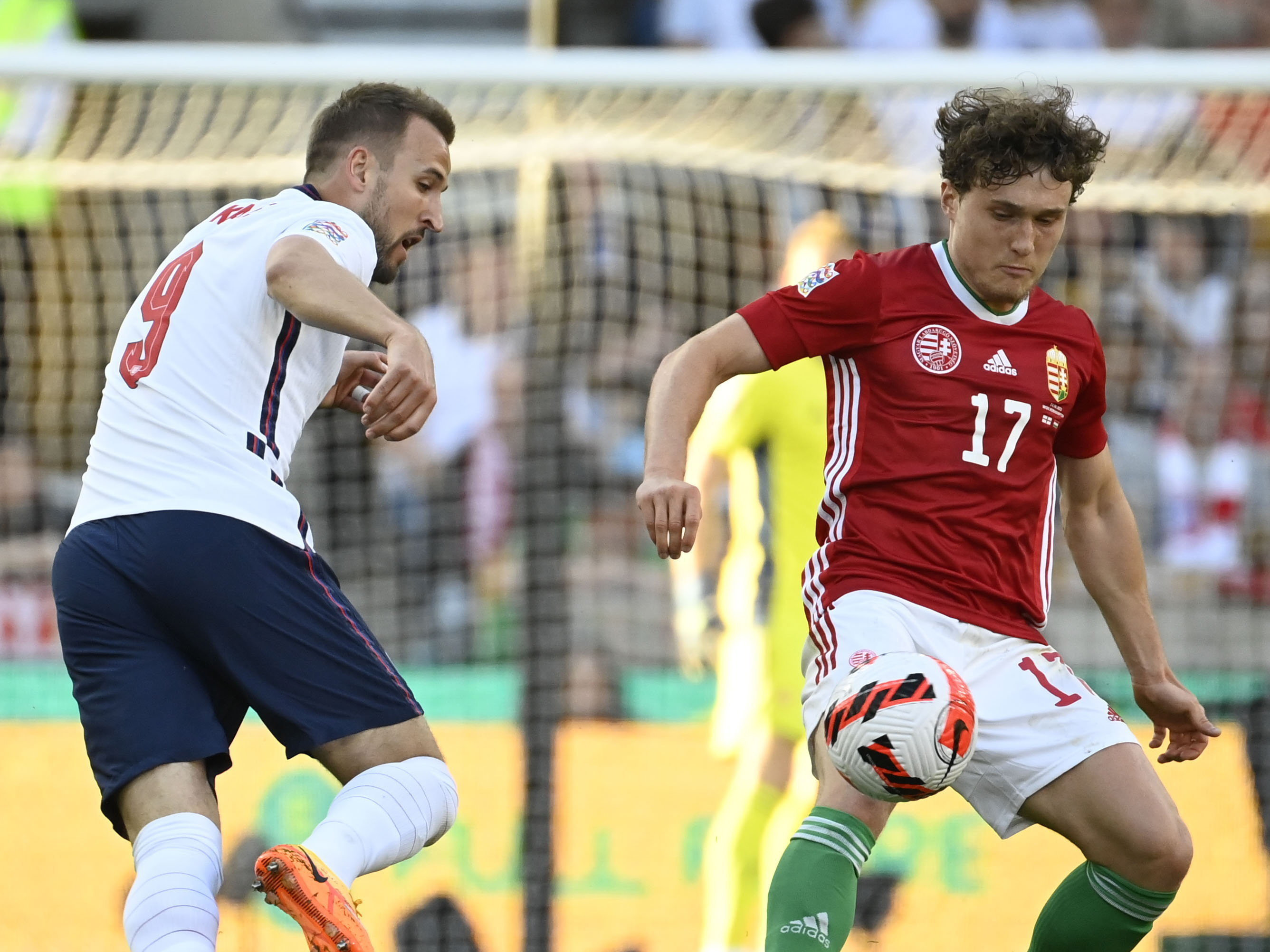 Callum Styles in action for Hungary against Harry Kane and England in 2022