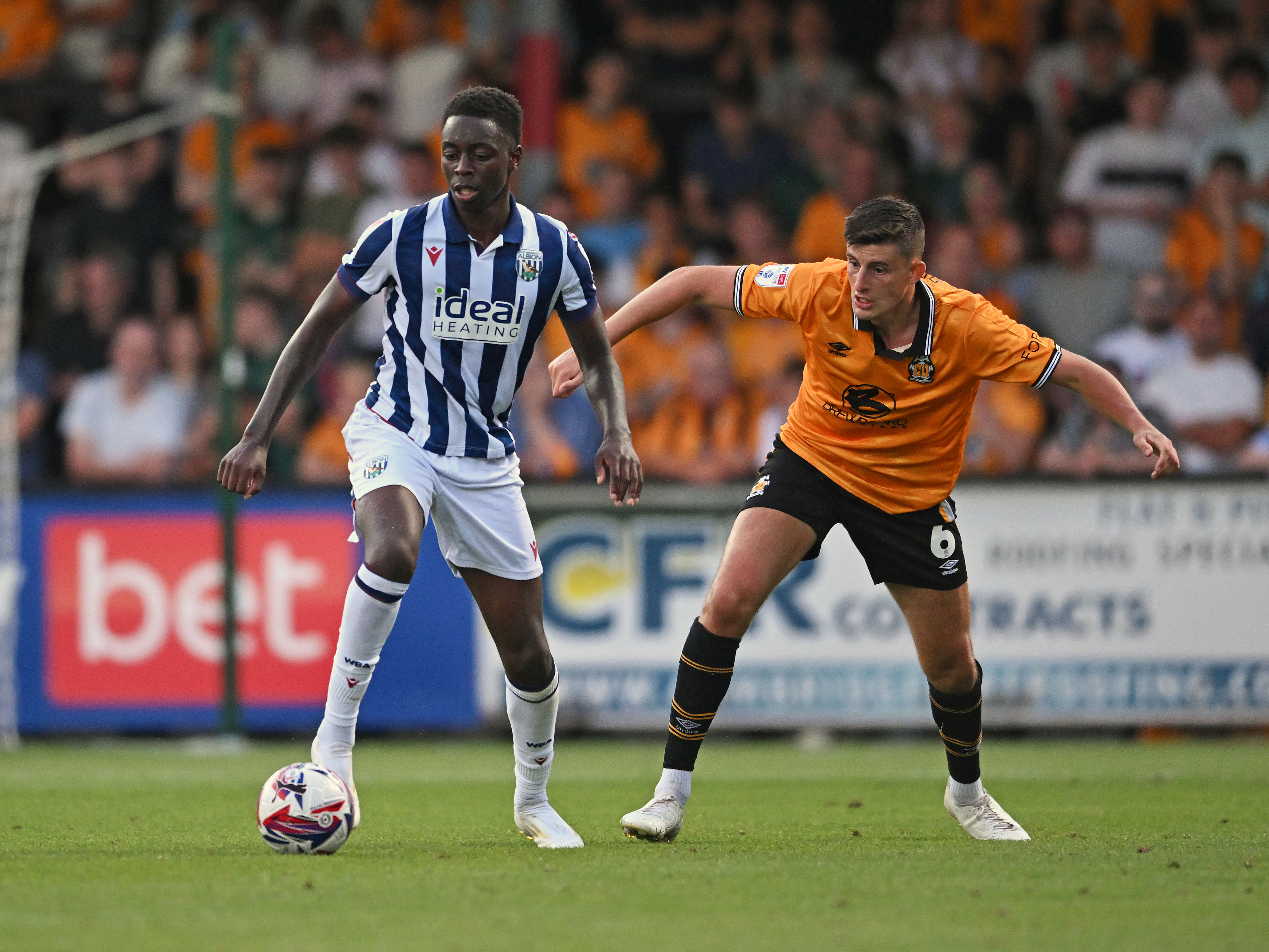 Eseosa Sule in action against Cambridge United in a pre-season friendly in the home kit 