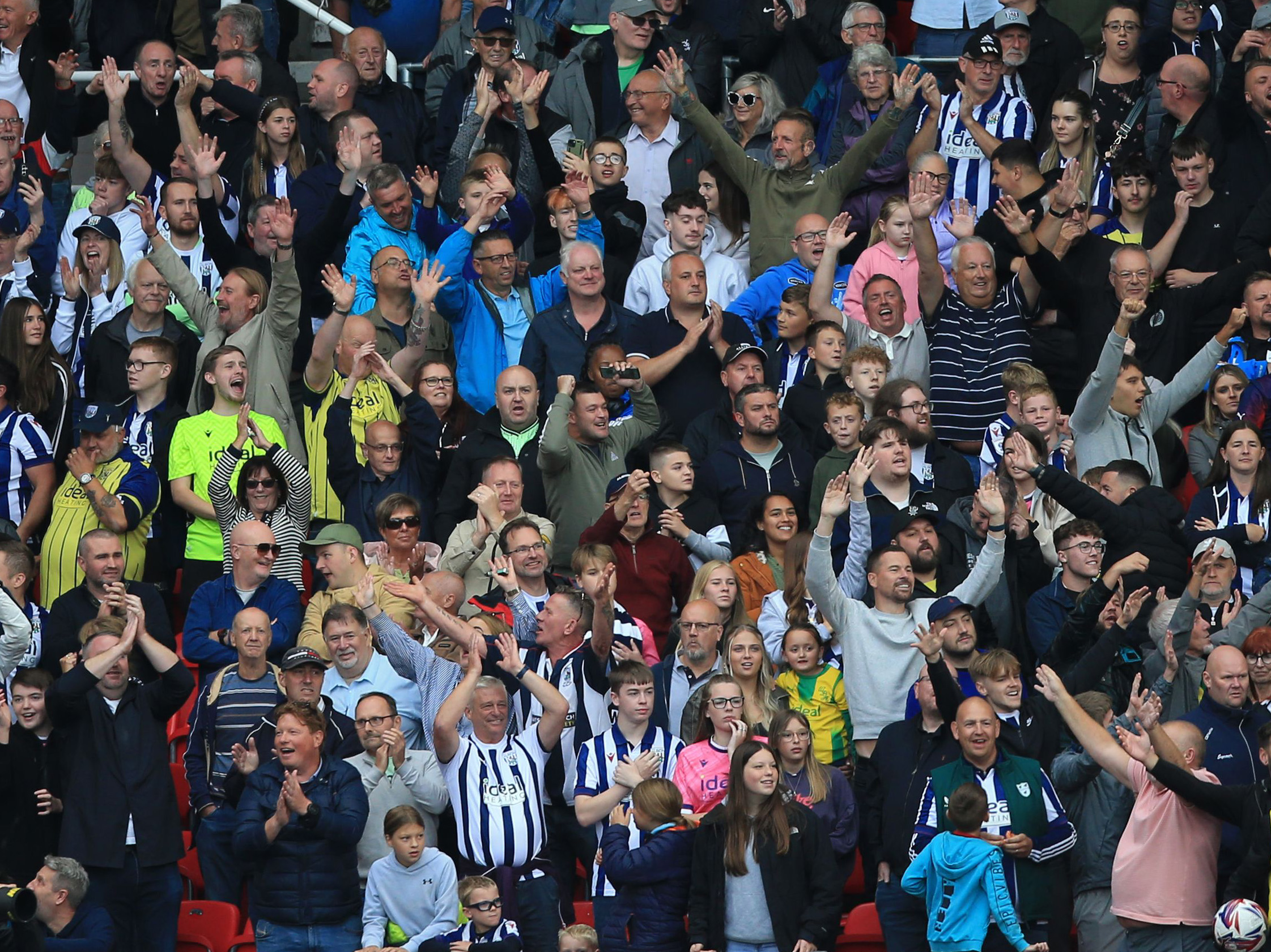 A general view of Albion fans celebrating a goal at Stoke 