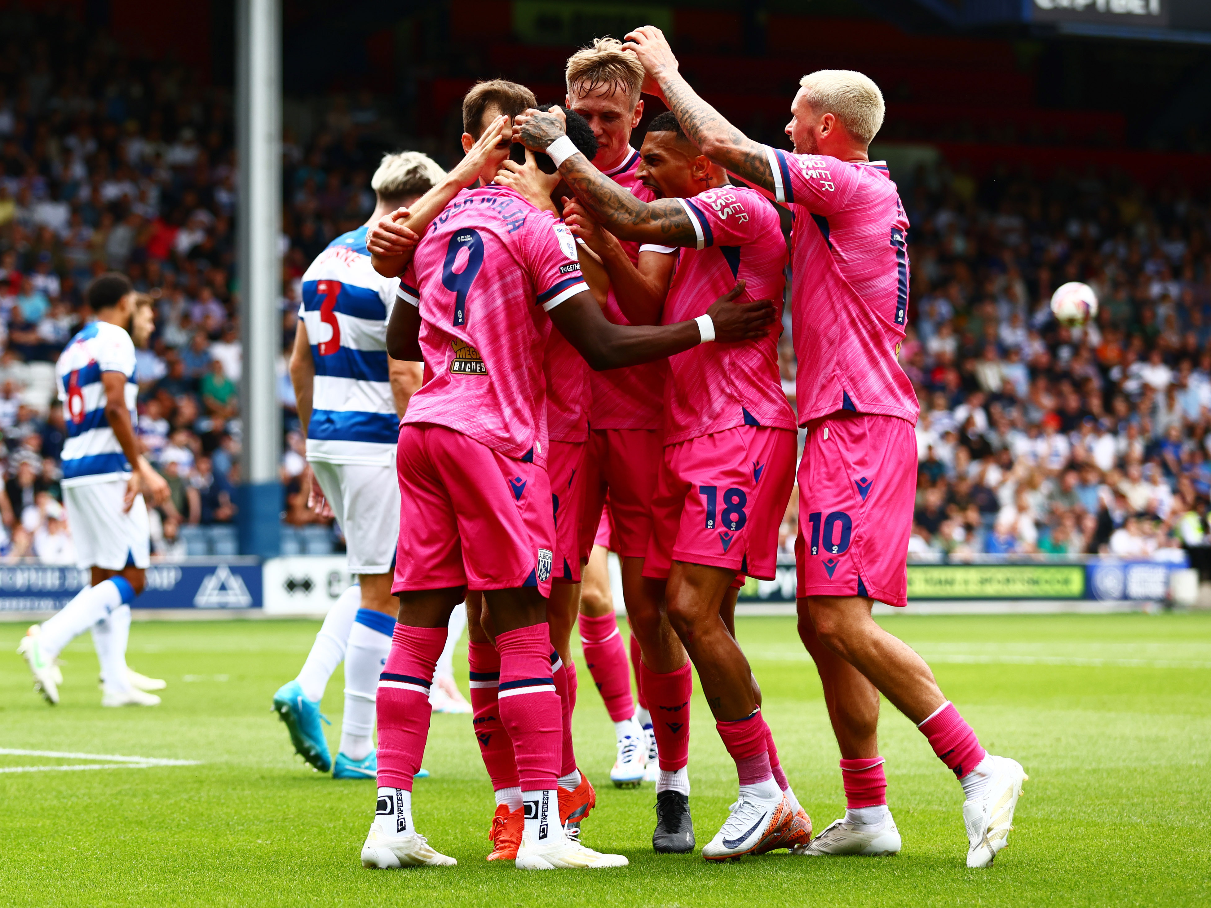 Josh Maja celebrates with his teammates at QPR