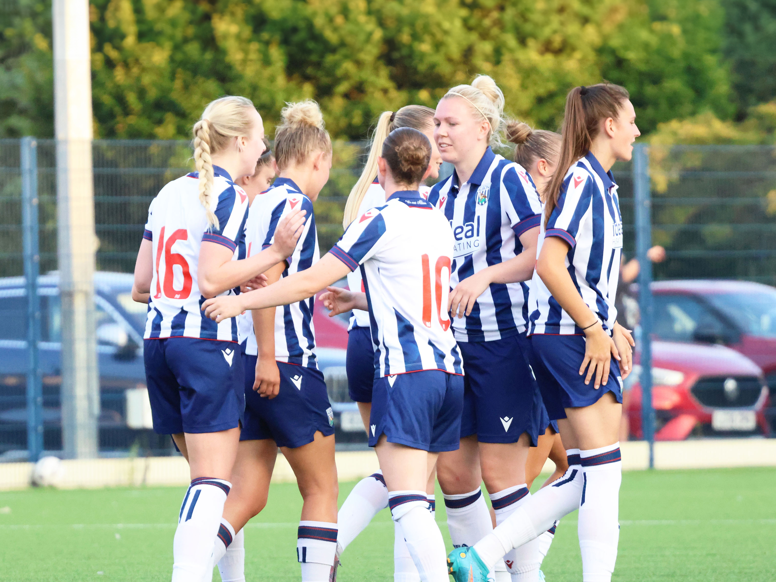 An image of Albion Women celebrating a goal