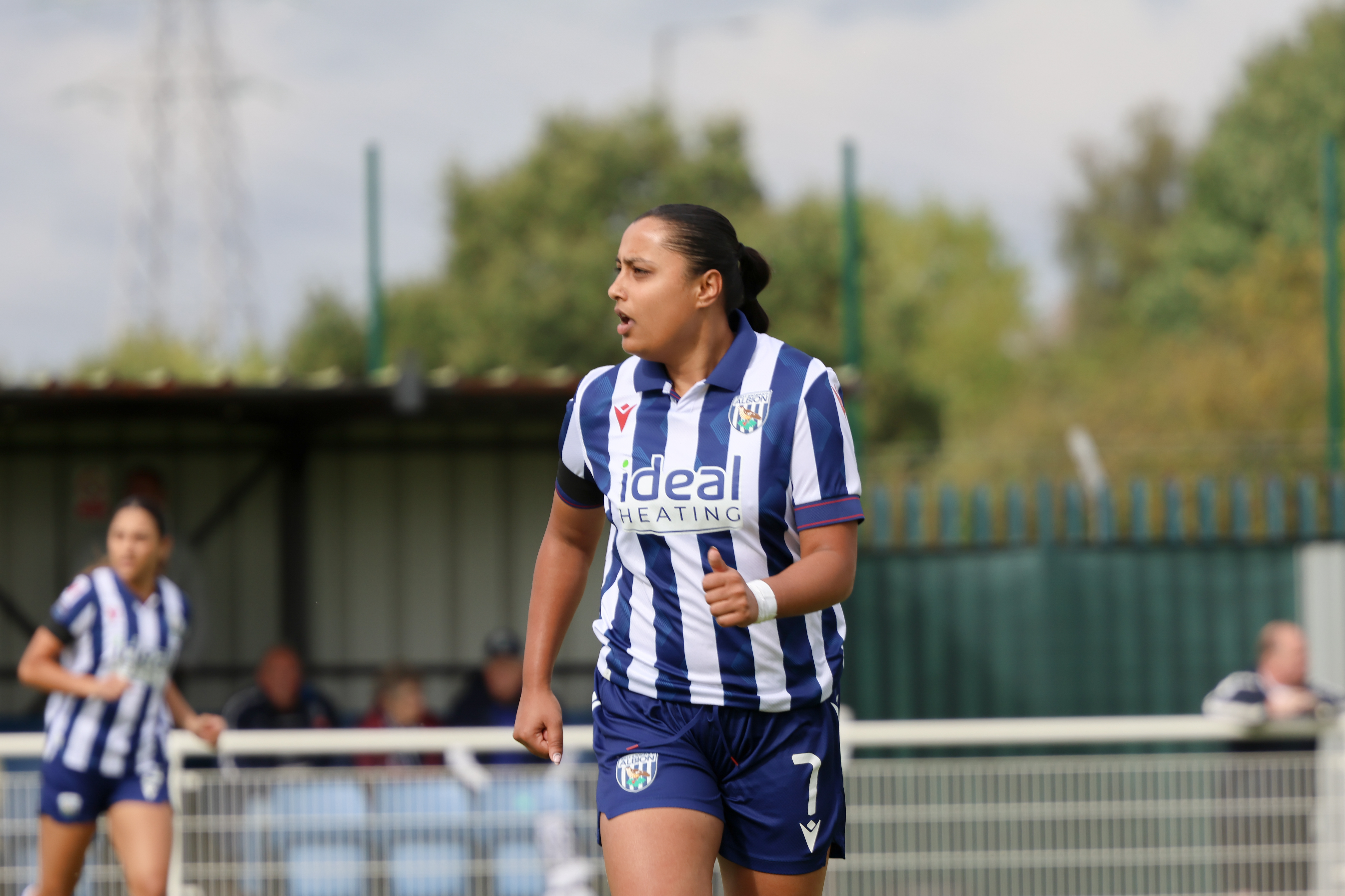 Simran Jhamat in action for Albion Women wearing the home kit 